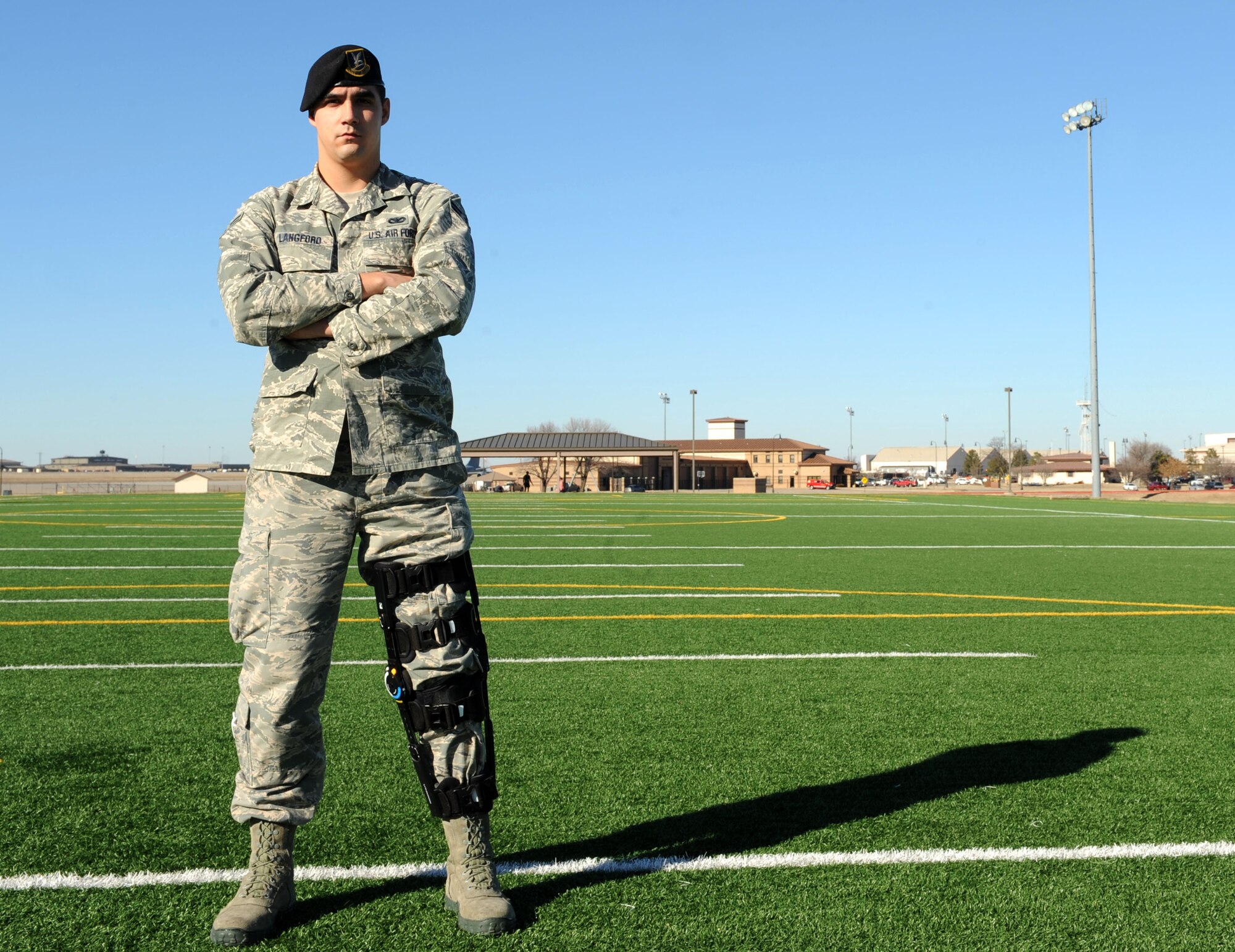 Airman 1st Class Jeffrey Langford, 22nd Security Forces Squadron elite guardsman, poses for a photo, Jan. 15, at McConnell Air Force Base, Kan. Langford tore several ligaments in his knee during an intramural football game and is going through rehab to rejoin the ranks of the elite guardsmen. (U.S. Air Force photo/Airman 1st Class David Bernal Del Agua)