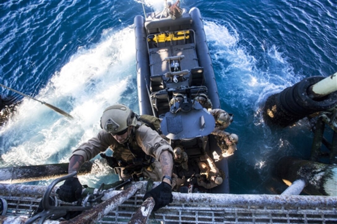 Marines board a gas and oil platform during maritime interoperability training off the coast of Santa Barbara, Calif., Jan. 16, 2015. The Marines are assigned to the 15th Marine Expeditionary Unit, Maritime Raid Force. The unit prepares the troops for their upcoming deployment by enhancing their combat skills and teaching them techniques for boarding vessels.