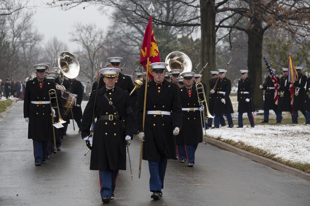 Col. Benjamin T. Watson, commanding officer, Marine Barracks Washington, D.C.  leads a funeral procession through Arlington National Cemetery, Arlington Va., Jan. 21.(U.S. Marine Corps Photo by Lance Cpl. Christian Varney/Released)