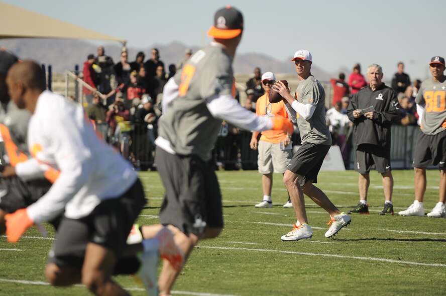 Matt Ryan, Atlanta Falcons quarterback assigned to Pro Bowl Team Irvin, drops back to pass during a practice game at Luke Air Force Base, Arizona, Jan. 22, 2015. The Pro Bowl players were practicing on base to show support for Airmen and to prepare for the game on Sunday. (U.S. Air Force photo by Staff Sgt. Staci Miller)