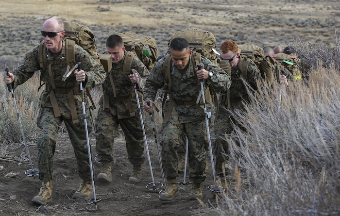 Marines with Headquarters and Service Company, Combat Logistics Battalion 26, Headquarters Regiment, 2nd Marine Logistics Group, hike roughly seven miles on the mountain trails of Bridgeport, California, Jan. 12, 2015. This hike served as a conditioning exercise for the 15-mile trek up a mountain to the field exercise that the Marines will be conducting during mountain warfare training. (U.S. Marine Corps photo by Lance Cpl. Kaitlyn Klein/released)