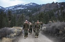 Marines with Headquarters and Service Company, Combat Logistics Battalion 26, Headquarters Regiment, 2nd Marine Logistics Group, hike roughly seven miles on the mountain trails of Bridgeport, California, Jan. 12, 2015. The Marines hiked with their ski poles in order to gain familiarity with the gear that they would be using during the training they will endure higher in the mountains. (U.S. Marine Corps photo by Lance Cpl. Kaitlyn Klein/released)