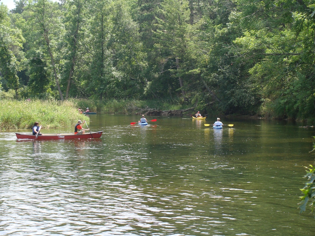 Recreators canoe Gull River, near Brainerd, Minnesota.