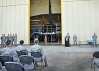 Maj. Aaron Milner, commander of the 920th Aircraft Maintenance Squadron, speaks during a ribbon-cutting ceremony at Hangar 630--the fixed-wing aircraft isochronal inspection (ISO) hangar of the 920th Rescue Wing. The hangar was part of a $4 million multiyear project to expand the structure by roughly 10,000 square feet (from the building's original 17,000) in order to fully enclose the wing's HC-130P/N refueling aircraft. (photo/Senior Airman Natasha Dowridge)