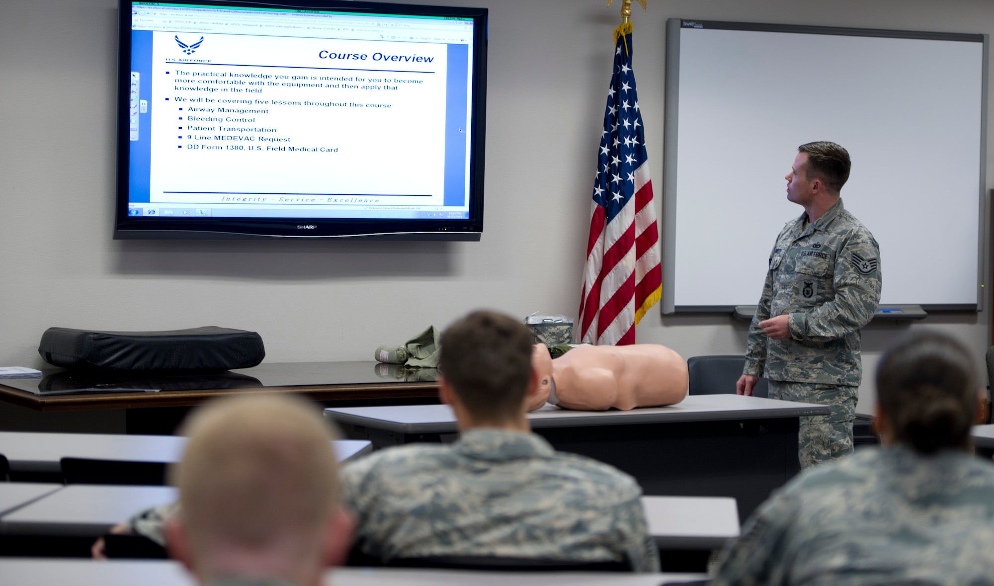 Staff Sgt. Dirk Cannedy, 1st Special Operations Security Forces Squadron unit trainer, gives an overview during a Self-Aid Buddy Care Hands-On course at the security forces squadron on Hurlburt Field, Fla., Jan. 22, 2015. SABC Hands-On is a two-hour course designed to give Airmen a basic lifesaving skill set for use at home station or deployed. (U.S. Air Force photo/Senior Airman Krystal M. Garrett)