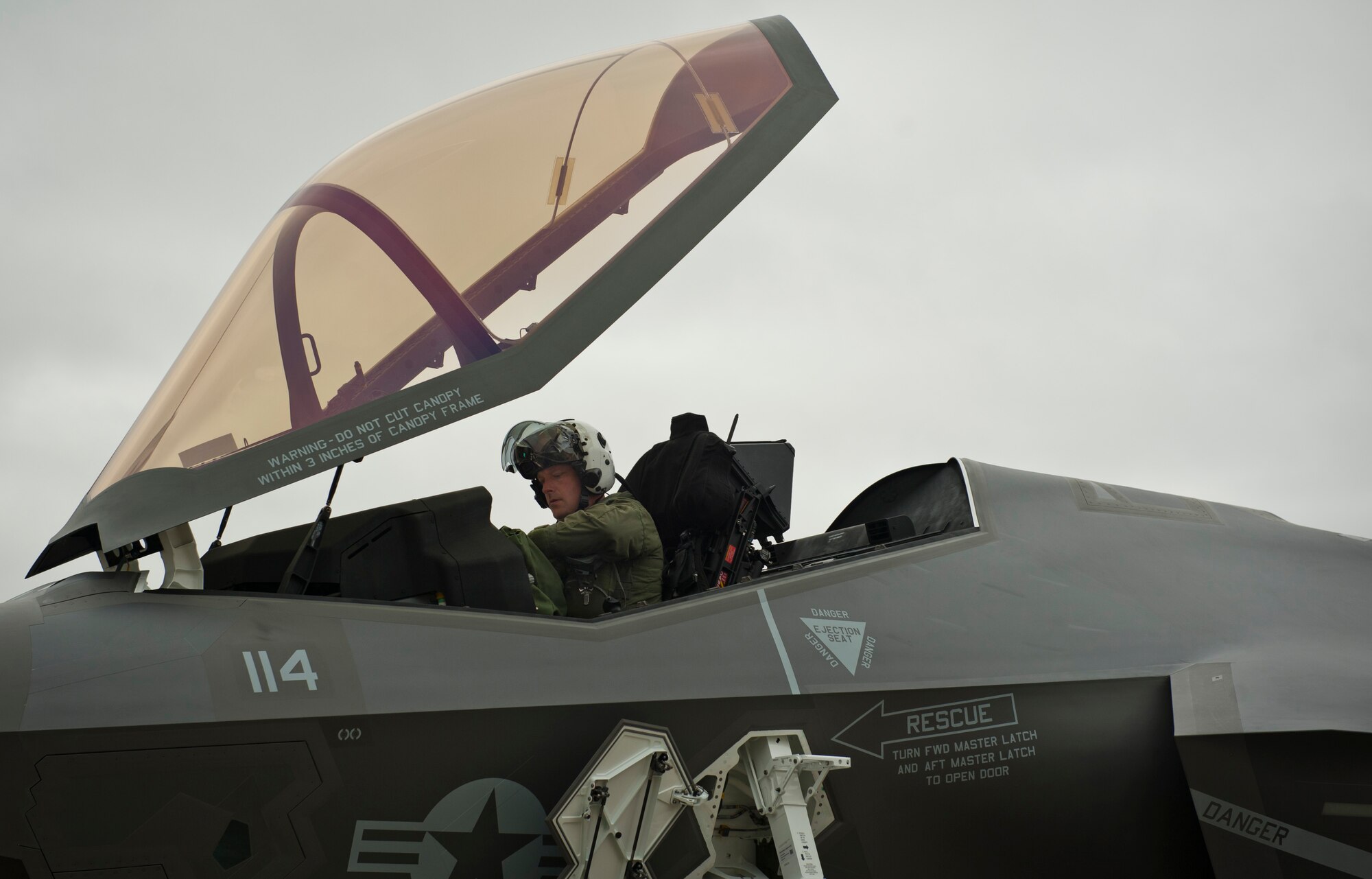 U.S. Marine Lt. Col. J.T. “Tank” Ryan, Marine Fighter Attack Training Squadron 501 detachment commander and F-35 pilot, delivers the first Marine Corps F-35C Lightning II carrier variant to Navy Attack Fighter Squadron 101 on Eglin Air Force Base, Fla., Jan. 13, 2015. Ryan flew the aircraft from the Lockheed Martin plant, Fort Worth, Texas, as the first of five Marine Corps F-35C model aircraft to be delivered to the VFA-101. The F-35C model brings 25% more range and a bigger weapons bay.  It also allows the Marine Corps to fly aboard Navy aircraft carriers, which continues an effective and long-standing tactical air integration program between the Navy and Marine Corps. (U.S. Air Force photo/Staff Sgt. Marleah Robertson)