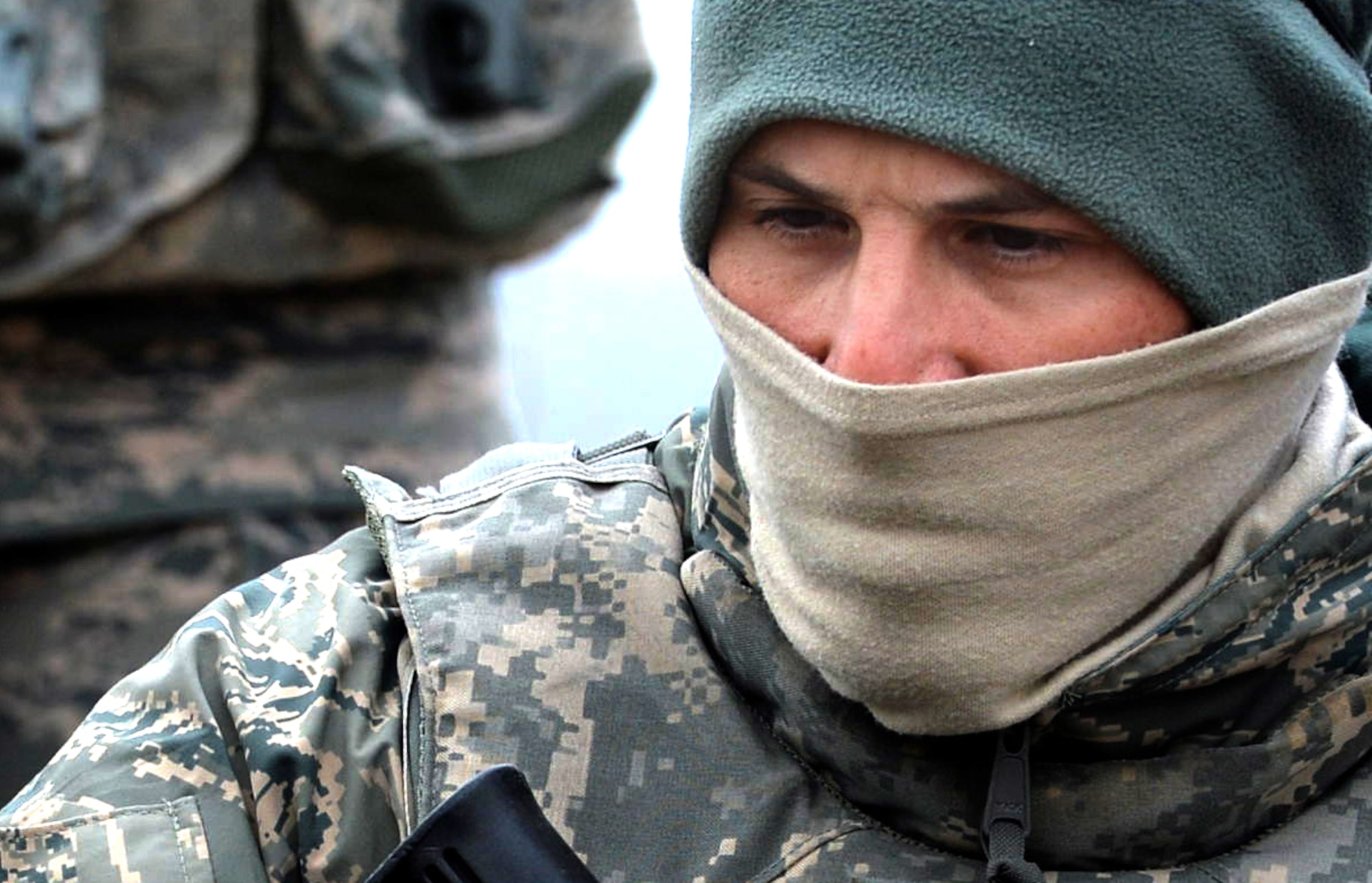 Senior Airmen Marcos Parisi, Base Security Operations course student, listens to instructions given by 99th Ground Combat Training Squadron cadre during the dismounted operations portion of the course at the Silver Flag Alpha Range Complex north of Las Vegas Dec. 17, 2014. Parisi is training for his first deployment and is currently assigned to the 512th Security Forces Squadron at Dover Air Force Base, Delaware. This is the last BSO course that will take place at Silver Flag Alpha, as the training location is set to close in early 2015. (U.S. Air Force photo by Tech. Sgt. Nadine Barclay/Released)

