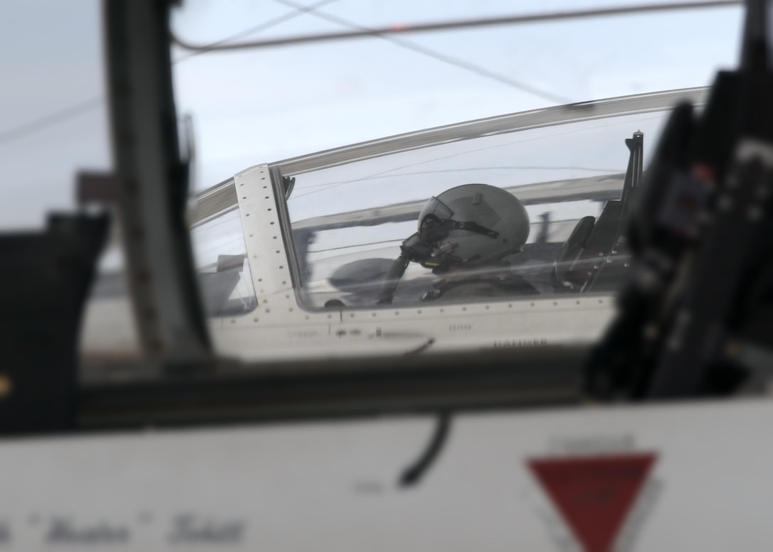 A Joint Specialized Undergraduate Pilot Training student makes his final checks in a T-6A Texan II here, Jan. 21. The Texan II is a single-engine, two-seater designed to train Joint Primary Pilot Training students in basic flying skills common to U.S. Air Force and Navy pilots. (U.S. Air Force photo by David Poe)