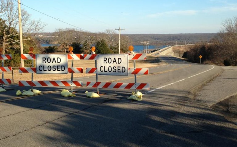 The barricades blocking traffic across  State Highway 100 bridge, which crosses Tenkiller Ferry Lake, will be removed Saturday, Jan. 24 by 7 p.m. The road has been closed since Oct. 14, 2014 for repairs to hatch covers on the roadway. 