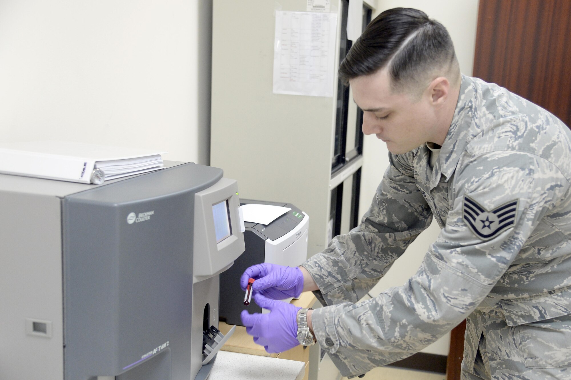 Staff Sgt. John, laboratory medical technician, prepares a complete blood count sample for the Coulter AcT diff2 CBC machine at an undisclosed location in Southwest Asia Jan. 21, 2015. The Coulter AcT diff2 offers a full range of features to include measuring red blood cells, which carry oxygen to white blood cells, which fight infection. John is currently deployed from Moody Air Force Base, Ga., and is a native of Christiansburg, Va. (U.S. Air Force photo/Tech. Sgt. Marie Brown)