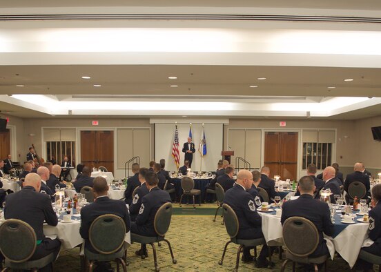 Chief Master Sgt. of the Air Force James Cody speaks with Airmen at an enlisted heritage dinner at Joint Base Pearl Harbor-Hickam, Hawaii, Jan. 16, 2015. Cody shared Air Force leadership knowledge during discussions with junior and senior enlisted Airmen and met with leadership groups and Airmen in their work areas during his two-day visit.  (U.S. Air Force photo by Tech. Sgt. James Stewart/Released)
