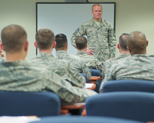 Chief Master Sgt. of the Air Force James Cody speaks with Airmen at a NCO professional enhancement course at Joint Base Pearl Harbor-Hickam, Hawaii, Jan. 16, 2015. Cody shared Air Force leadership knowledge during discussions with junior and senior enlisted Airmen and met with leadership groups and Airmen in their work areas during his two-day visit. (U.S. Air Force photo by Tech. Sgt. James Stewart/Released)
