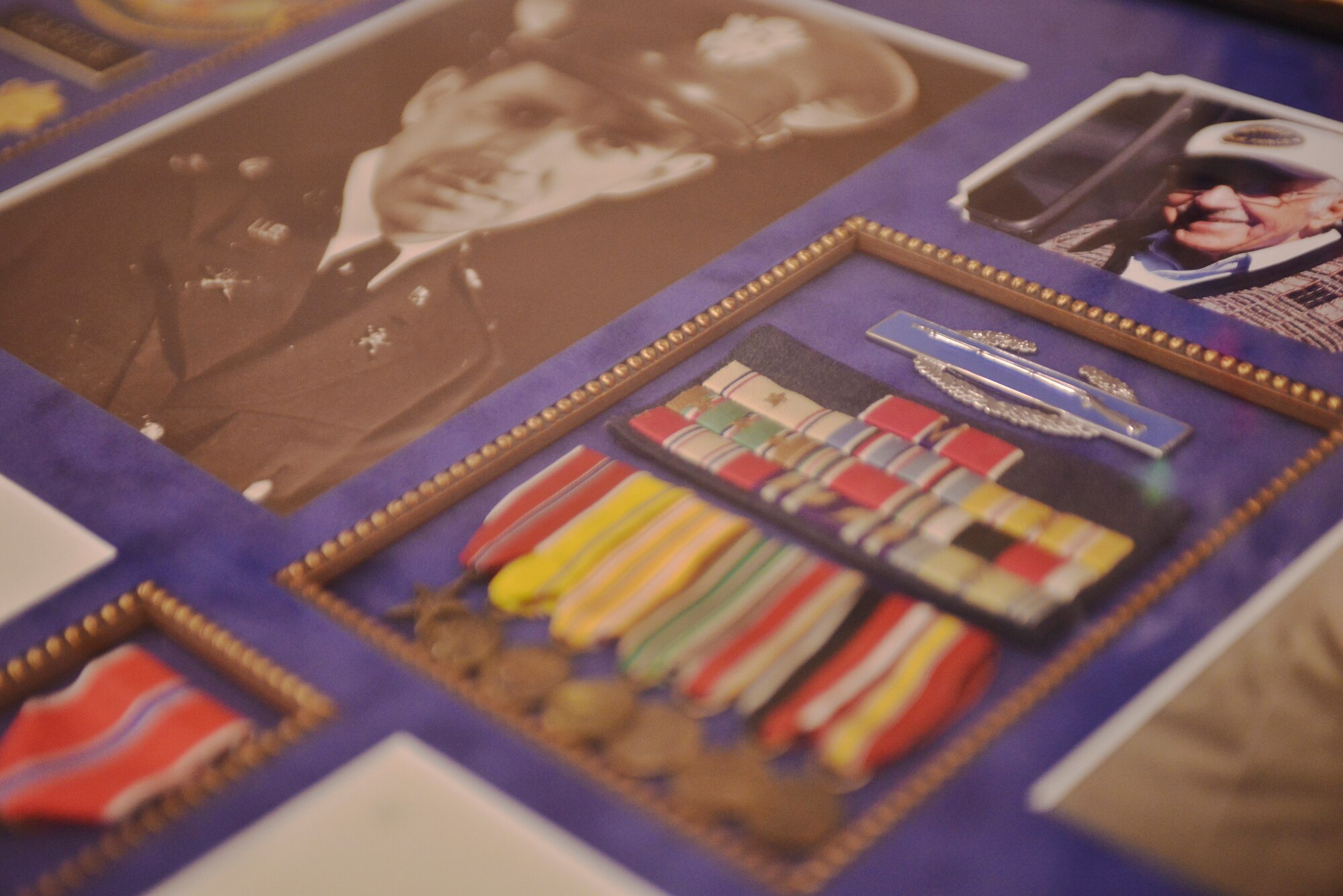 A shadowbox is displayed during the celebration of 100-year-old U.S. Army Air Corps and Air Force veteran during his birthday celebration at Spokane Veterans medical Center, Jan. 21, 2015, Spokane, Wash. George “Bud” Garvin, born in 1915, served 30 years in the united states armed forces and retired as a Major in the U.S. Air Force. (U.S. Air Force photo by Staff Sgt. Alexandre Montes) 