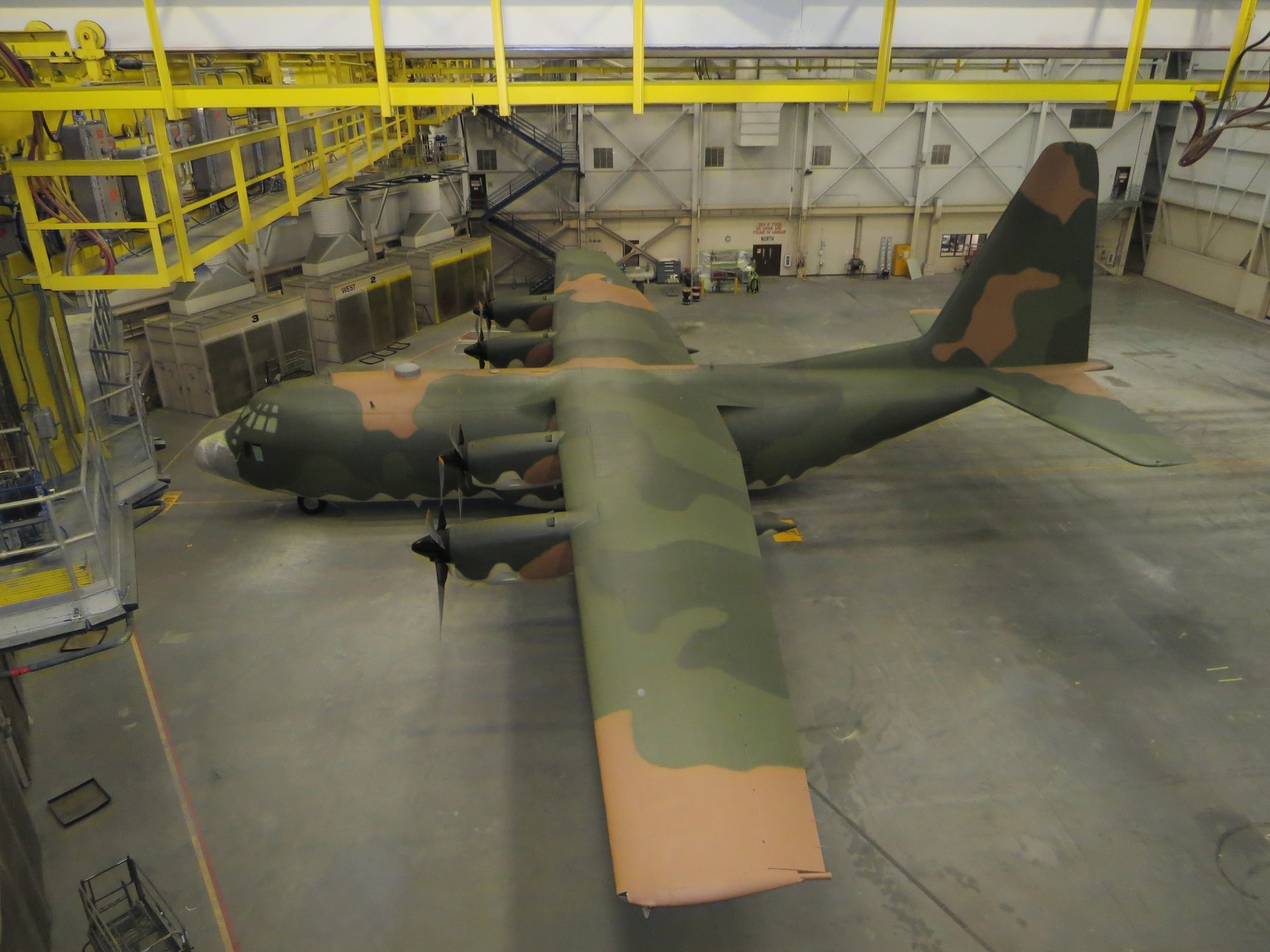 Airmen from the 62nd Maintenance Squadron spent more than two months repainting a C-130 Hercules in the Vietnam-era camouflage scheme.  The aircraft was painted for the McChord Air Museum and will be on display in the McChord Air Park in the near future. (Courtesy photo)