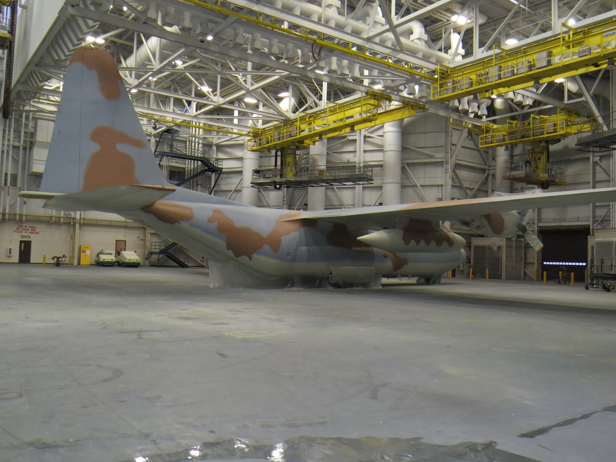 Airmen from the 62nd Maintenance Squadron spent more than two months repainting a C-130 Hercules in the Vietnam-era camouflage scheme.  The aircraft was painted for the McChord Air Museum and will be on display in the McChord Air Park in the near future. (Courtesy photo)