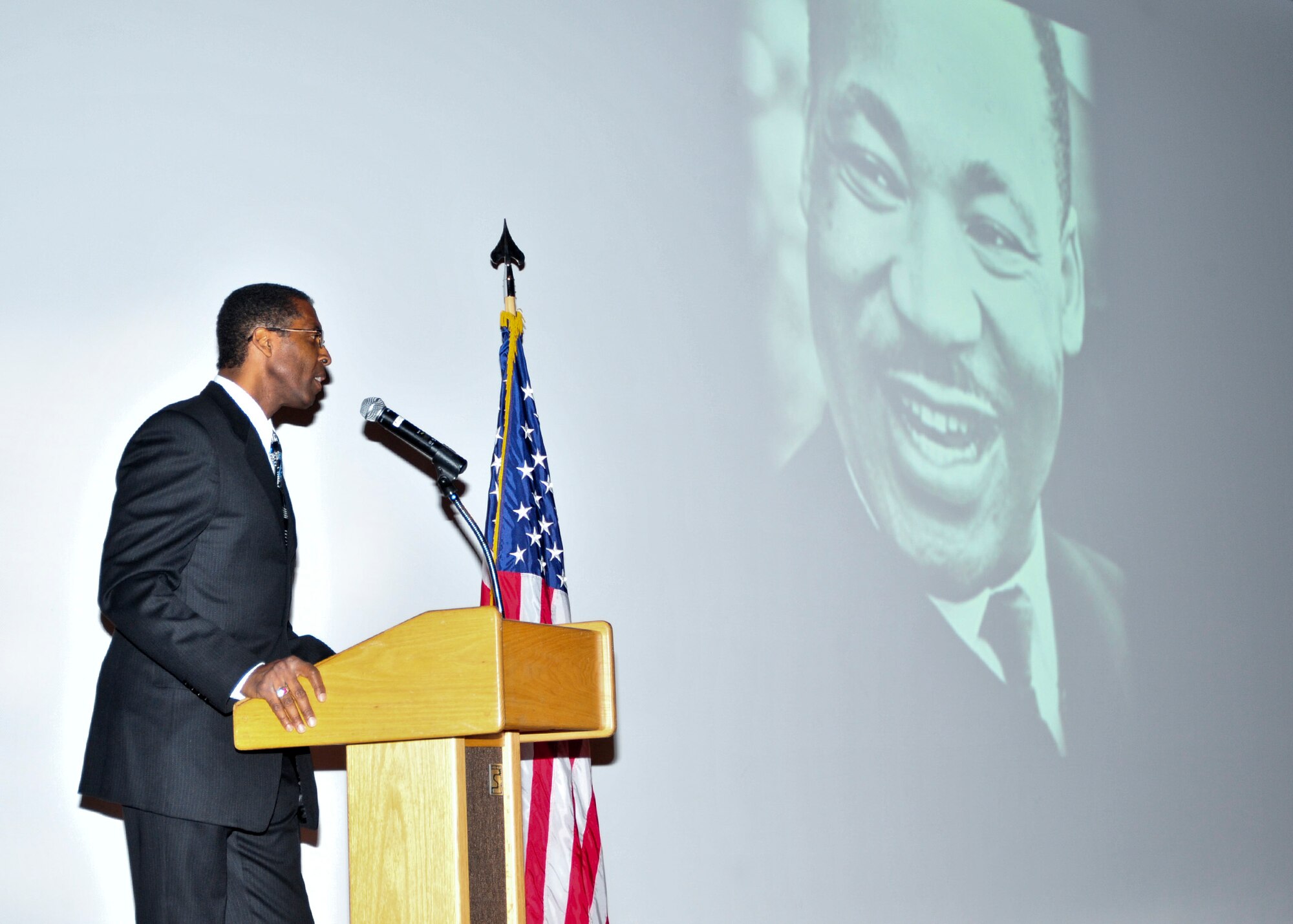 David Bellamy, 355th Operations Support Squadron chief of plans, exercises and readiness, serves as guest speaker during the Martin Luther King Commemoration Tribute at Davis-Monthan Air Force Base, Ariz., Jan. 22, 2015.  After Bellamy?s speech, attendees watched a documentary based on the remembrance of the life and death of Dr. Martin Luther King Jr.  (U.S. Air Force Photo by Airman 1st Class Chris Massey/Released)