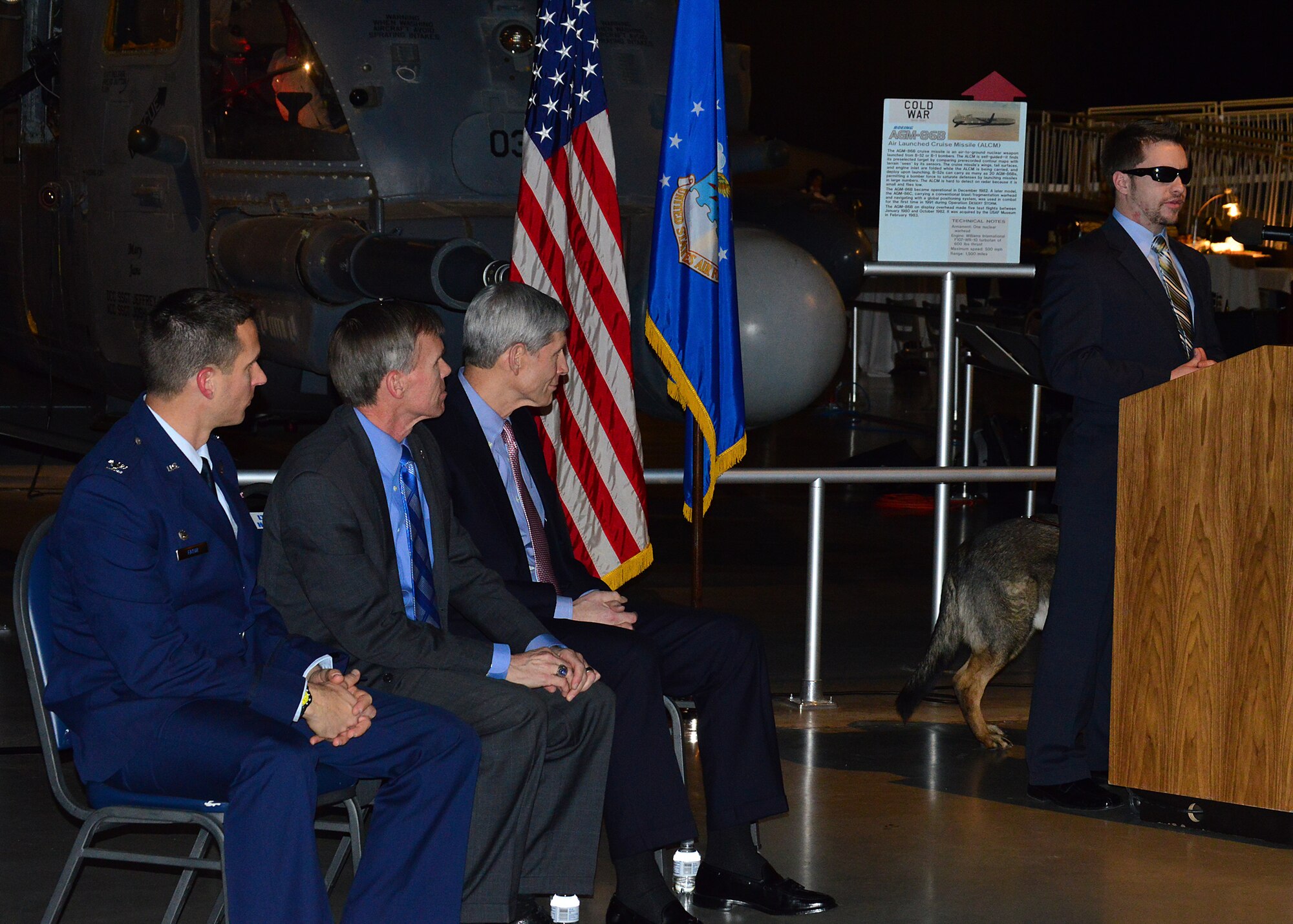 DAYTON, Ohio -- SSgt.(Ret.) Mike Malarsie speaks at the "Duty First, Always Ready" exhibit opening on Jan. 23, 2015 in the Cold War Gallery at the National Museum of the U.S. Air Force. Pictured from left to right are Former Commander 10th Air Support Operations Squadron Col. Roy Fatur, National Museum of the U.S. Air Force Director Lt. Gen.(Ret.) Jack Hudson, Former Chief of Staff Gen.(Ret.) Norton Schwartz, and SSgt.(Ret.) Mike Malarsie. (U.S. Air Force photo)