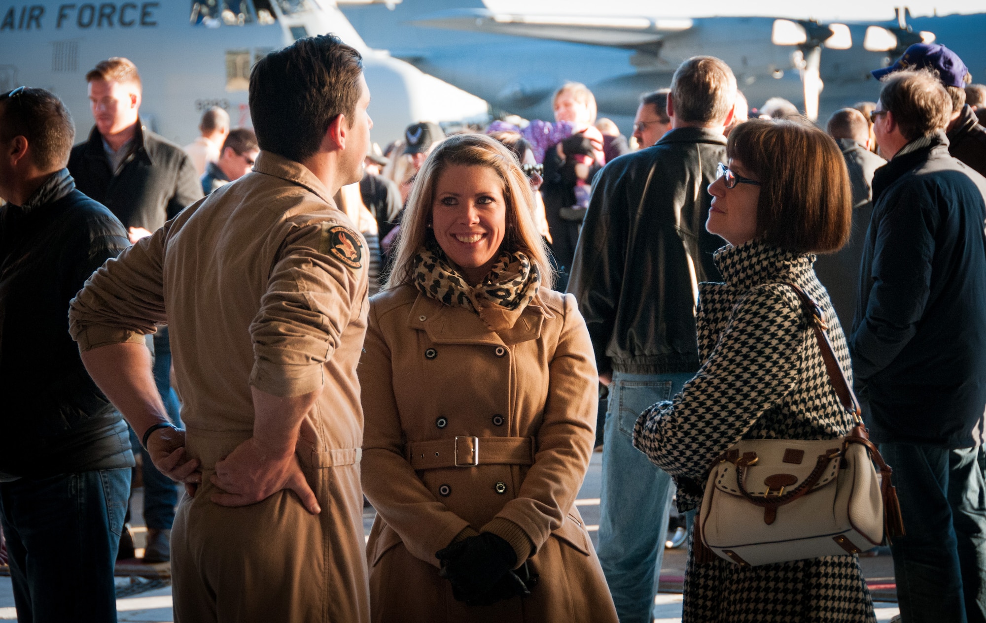Girlfriend Kelli Hayes can't stop smiling at Tech. Sgt. Dylan Strom, 96th Airlift Squadron loadmaster, upon his return from overseas. Friends and family were there to welcome home Airmen to the 934th Airlift Wing as they arrived at the Minneapolis-St. Paul Air Reserve Station, Minn., Jan. 18. (U.S. Air Force photo by Staff Sgt. Corban Lundborg/Released)