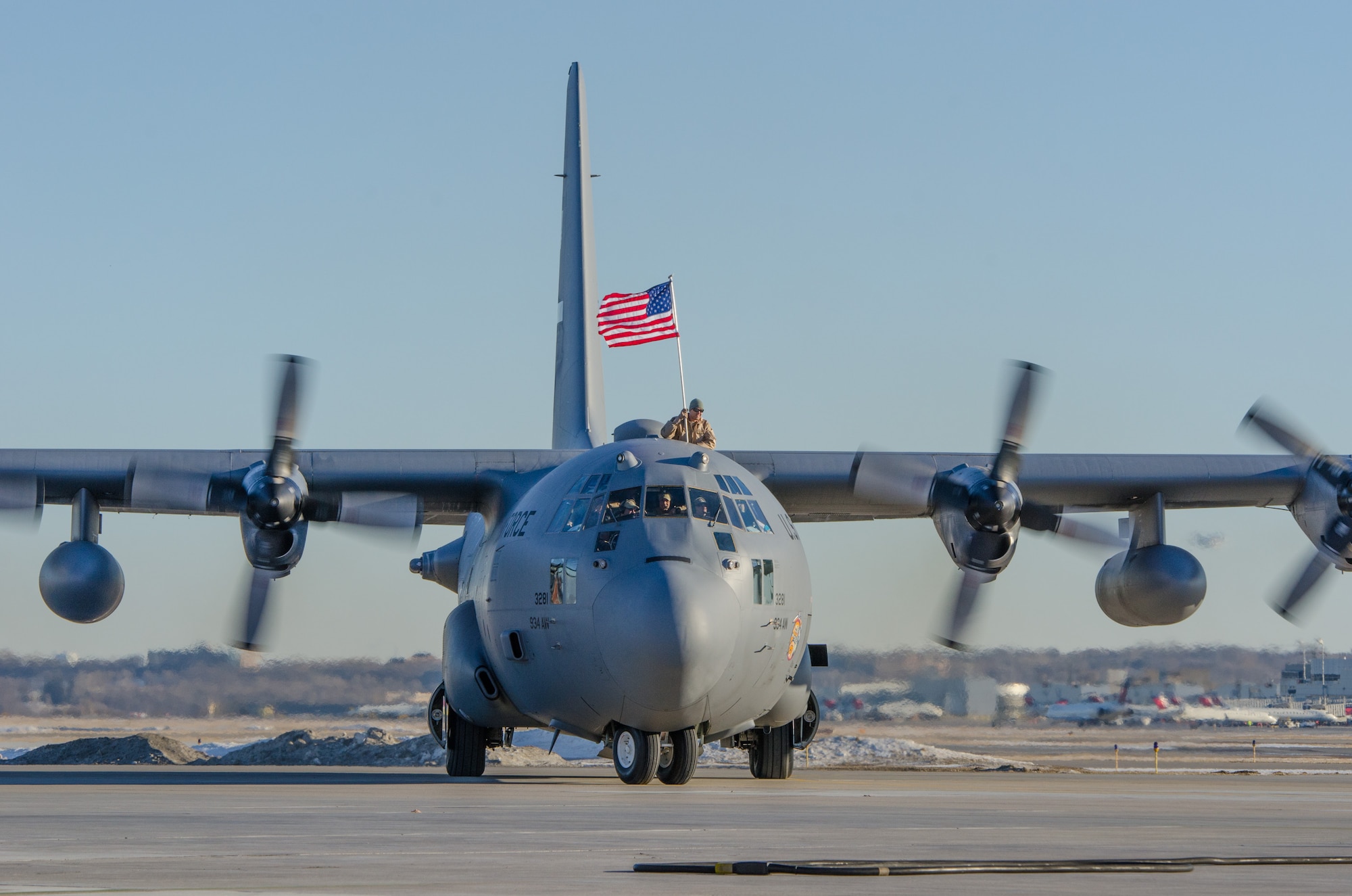 Airmen and family members welcome home deployed Airmen from the 934th Airlift Wing, Jan. 18. (U.S. Air Force photo by Master Sgt. Eric Amidon/Released)