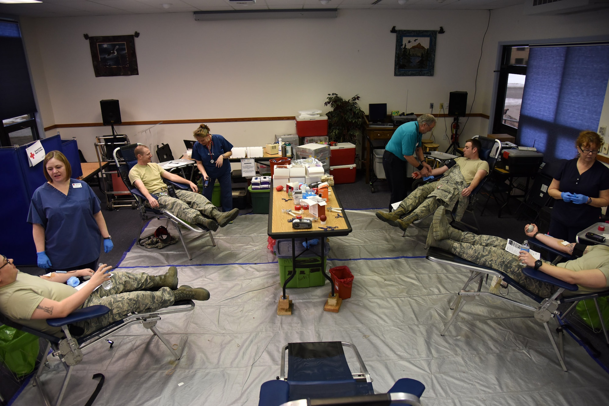 Airmen donate blood during Malmstrom Air Force Base’s Wing Blood Drive Jan. 20 at the base chapel. Since 1970, January has been known as National Blood Donor Month. It’s a time when blood organizations like the American Red Cross honor the nearly 11 million people who donate blood each year and encourage others to start the New Year off right by donating the gift of life. (U.S. Air Force photo/Tech. Sgt. Chad Thompson)