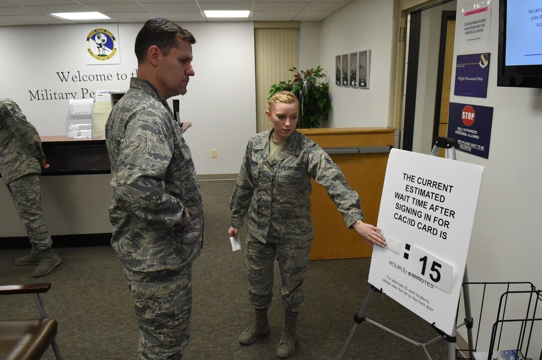 Airman 1st Class Asia Patterson, 11th Force Support Squadron Military Personnel Section force management rep, briefs Col. John Devillier, 88th Air Base Wing commander, about the 11 MPS and its importance on Joint Base Andrews, Md., Jan. 12, 2015. Team Andrews highlights the 11 MPS as part of the mission during the Commander-in-Chief’s Installation Excellence Award evaluation. (U.S. Air Force photo/Airman 1st Class Joshua R. M. Dewberry)