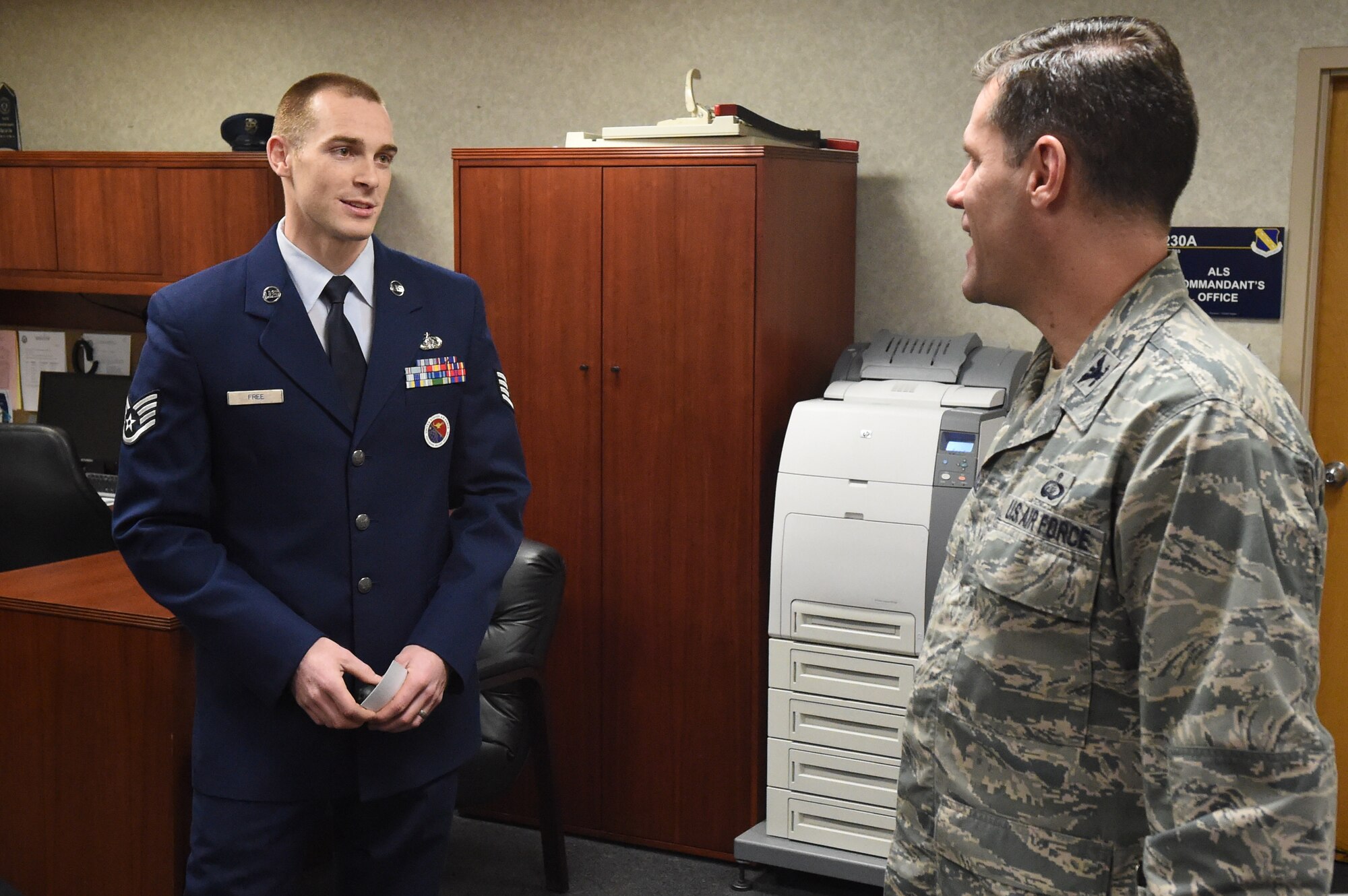 Staff Sgt. Carl Free, Airmen Leadership School instructor, briefs Col. John Devillier, 88th Air Base Wing commander, about the Airman Leadership School program and it’s accomplishments on Joint Base Andrews, Md., Jan. 12, 2015. Team Andrews highlights ALS as part of the mission during the Commander-in-Chief’s Installation Excellence Award evaluation. (U.S. Air Force photo/Airman 1st Class Joshua R. M. Dewberry)
