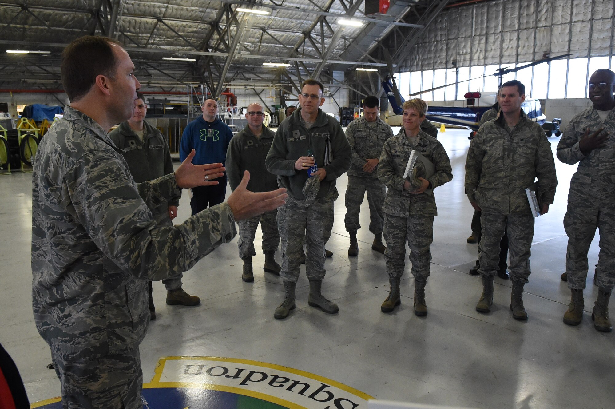 Commander-in-Chief’s Installation Excellence Award evaluators are briefed at the 1st Helicopter Squadron by unit members on Joint Base Andrews, Md., Jan. 12, 2015. Andrews is one of two finalists for the award. (U.S. Air Force photo/Airman 1st Class Joshua R. M. Dewberry)