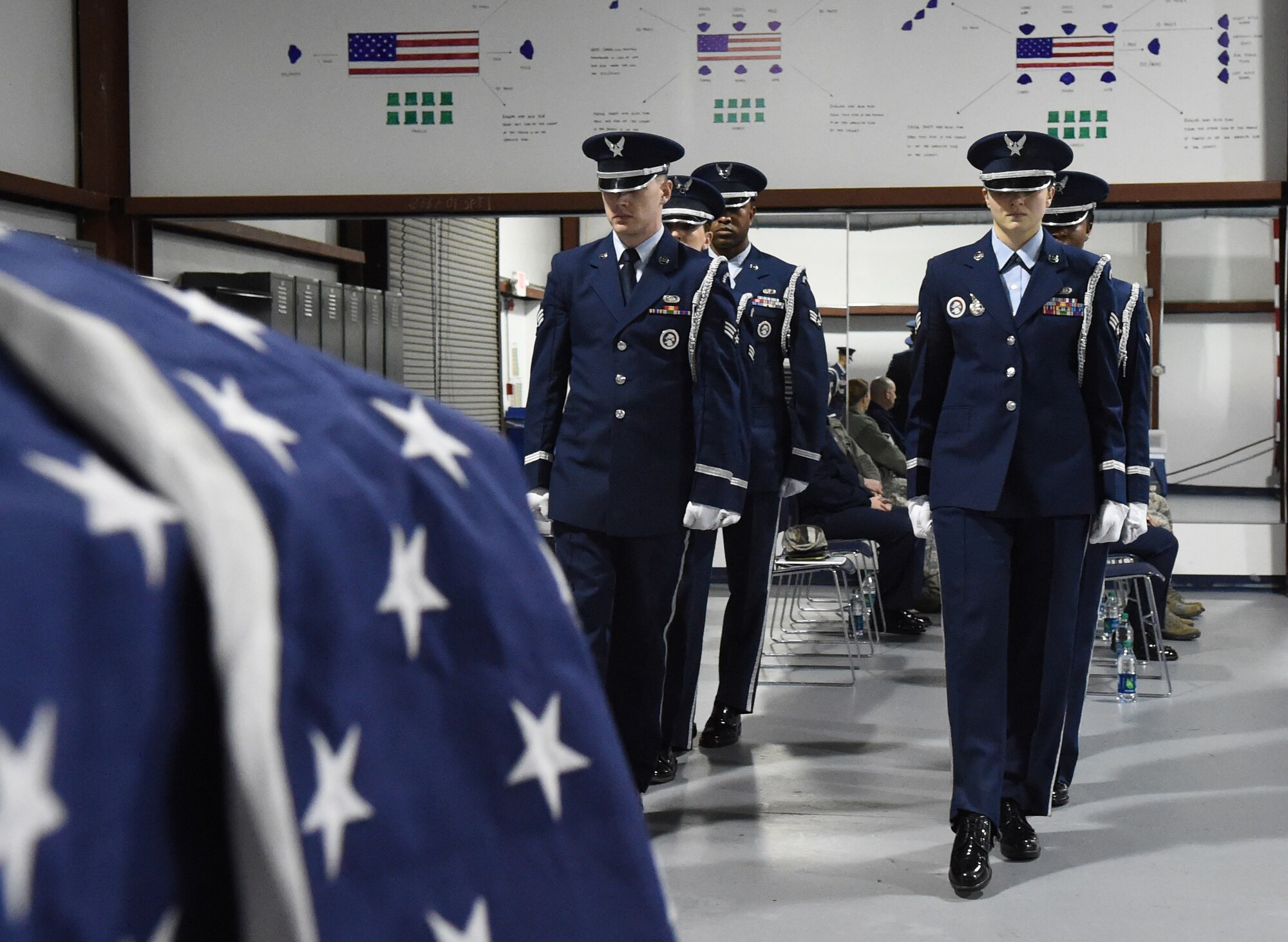 The Joint Base Andrews Honor Guard demonstrates a casket carry for a funeral ceremony on Joint Base Andrews, Md., Jan. 12, 2015. The demonstration was part of the Commander-in-Chief’s Installation Excellence Award visit. (U.S. Air Force photo/Airman 1st Class Joshua R. M. Dewberry)