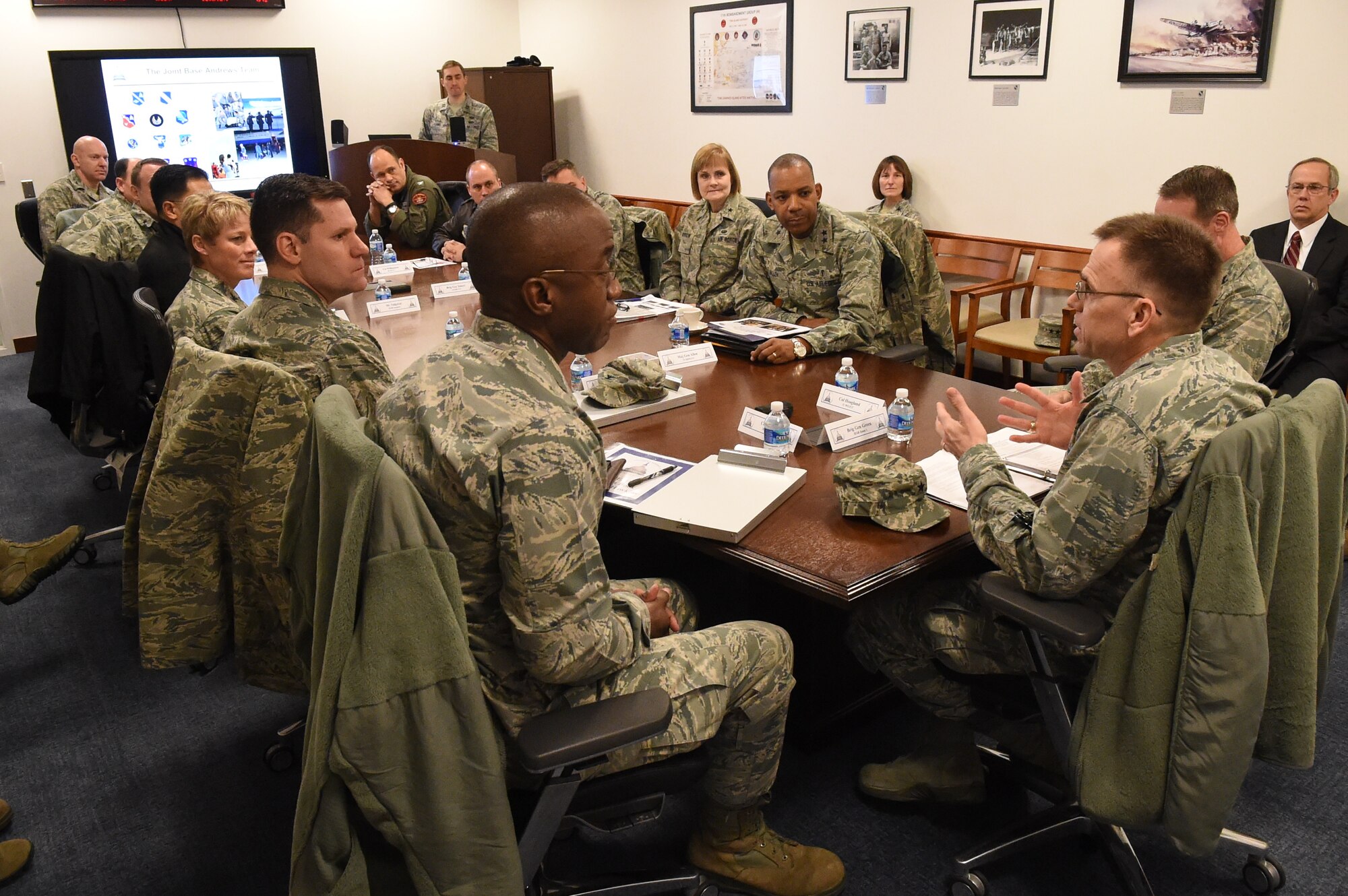 Commander-in-Chief’s Installation Excellence Award evaluators speak to Joint Base Andrews Wing Commanders at JBA, Md., Jan. 12, 2015. Andrews is one of two finalists for the award, competing against Royal Air Force Lakenheath, England. (U.S. Air Force photo/Airman 1st Class Joshua R. M. Dewberry)