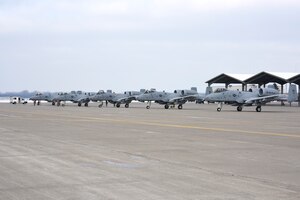 A-10 Thunderbolt II aircraft line up for taxiing as the 107th Fighter Squadron prepares to takeoff to Operation Snowbird at Davis-Monthan AFB, Ariz., on Friday, January 23.   Operation Snowbird allows military flying units to take advantage of the optimal weather conditions and live-fire ranges available in southern Arizona during the winter months, when home station training may be hampered by snow and ice. About 200 Airmen and 10 aircraft from the 127th Wing deployed and will support this year's operation.  (U.S. Air National Guard photo by Brittani Baisden)