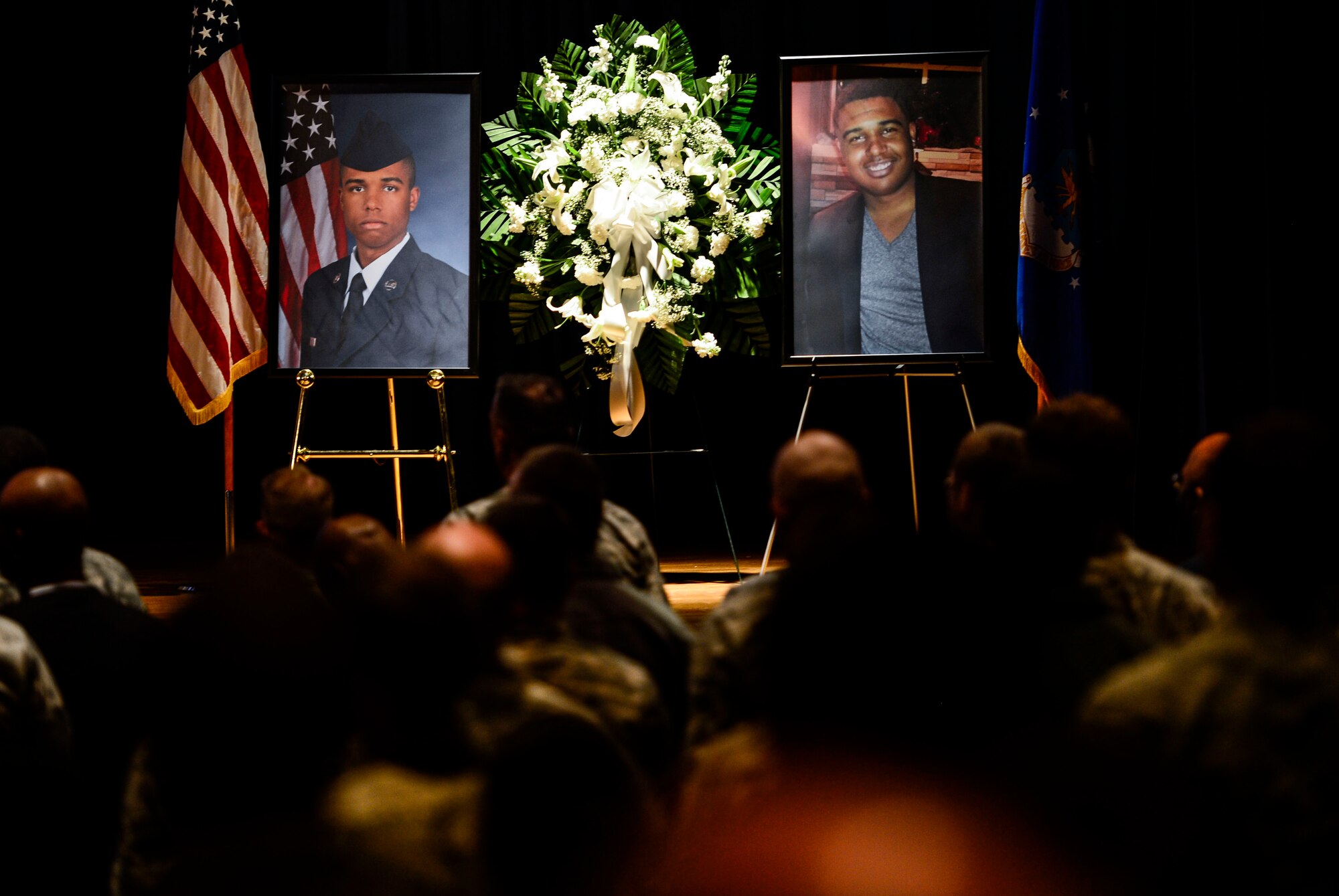 Men and women attend a memorial service for U.S. Air Force Senior Airman Andre Jackson, 10th Intelligence Squadron client systems technician, at Langley Air Force Base, Va., Jan. 16, 2015. Jackson, a native of North Richland Hills, Texas, entered the Air Force in March 2011 and passed away Dec. 18, 2014. (U.S. Air Force photo by Senior Airman Kayla Newman/Released) 