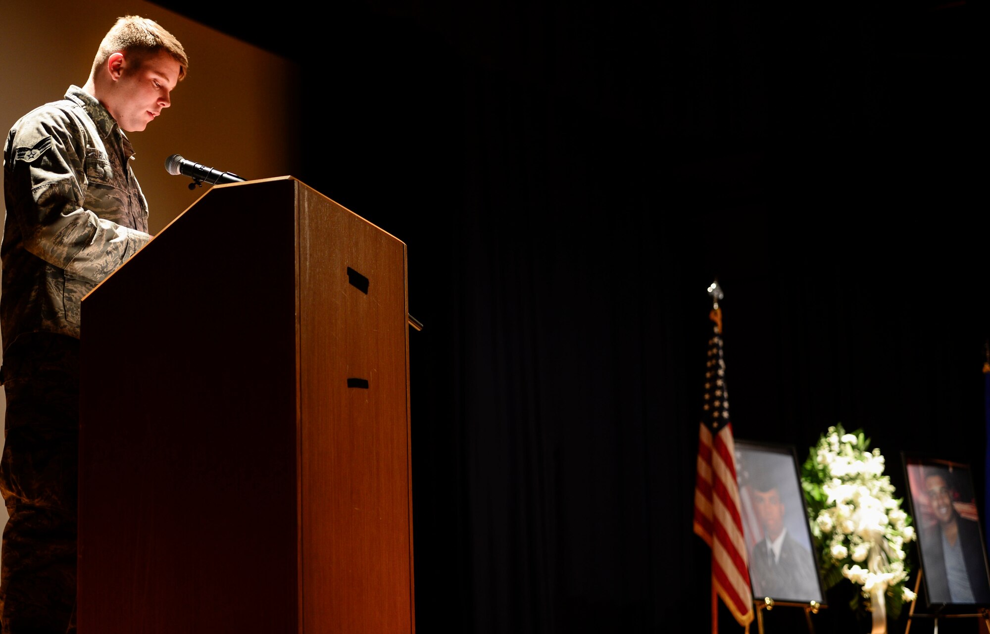 U.S. Air Force Senior Airman Thomas Blauvelt, 10th Intelligence Squadron core services technician, shares a few words about Senior Airman Andre Jackson, 10th IS client systems technician, during a memorial service at Langley Air Force Base, Va., Jan. 16, 2015. The service was held in honor of Jackson, who passed away Dec. 18, 2014. (U.S. Air Force photo by Senior Airman Kayla Newman/Released) 