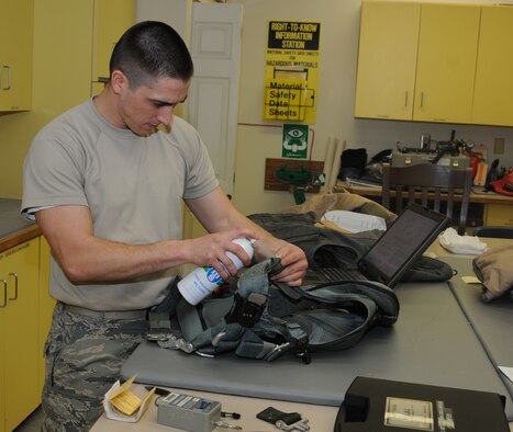 Oregon Air National Guard Staff Sgt. Christopher Hernandez an Aircrew Flight Equipment Specialist assigned to the 173rd Fighter Wing, Kingsley Field, Ore., performs routine maintenance on a harness used by the F-15 Pilots. Routine maintenance is an important part in the upkeep of flight equipment and insures components stay in good working order, Jan. 21, 2015. (U.S. Air National Guard photo by Tech. Sgt. Daniel J. Condit/Released)