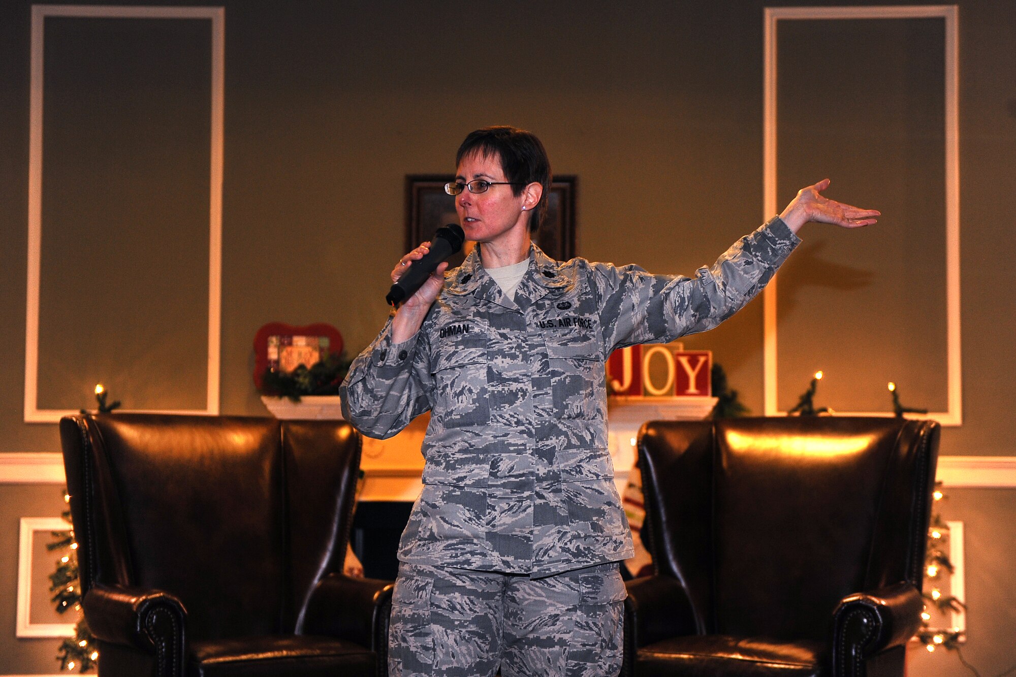 U.S. Air Force Lt. Col. Mynda Ohman, a Staff Judge Advocate with the 55th Legal Office, shares how a shift in her mindset has added fulfillment to her Air Force career during the inaugural Story Tellers event called ‘The Long and Short of it’ held on Dec. 16 at the Patriot Club on Offutt Air Force Base, Neb.  This mentorship event, that will take place every other month, encourages Airmen to come forward and share their personal stories of accomplishments and or adversities so others can share their success and learn from them.   (U.S. Air Force photo by Josh Plueger/Released)