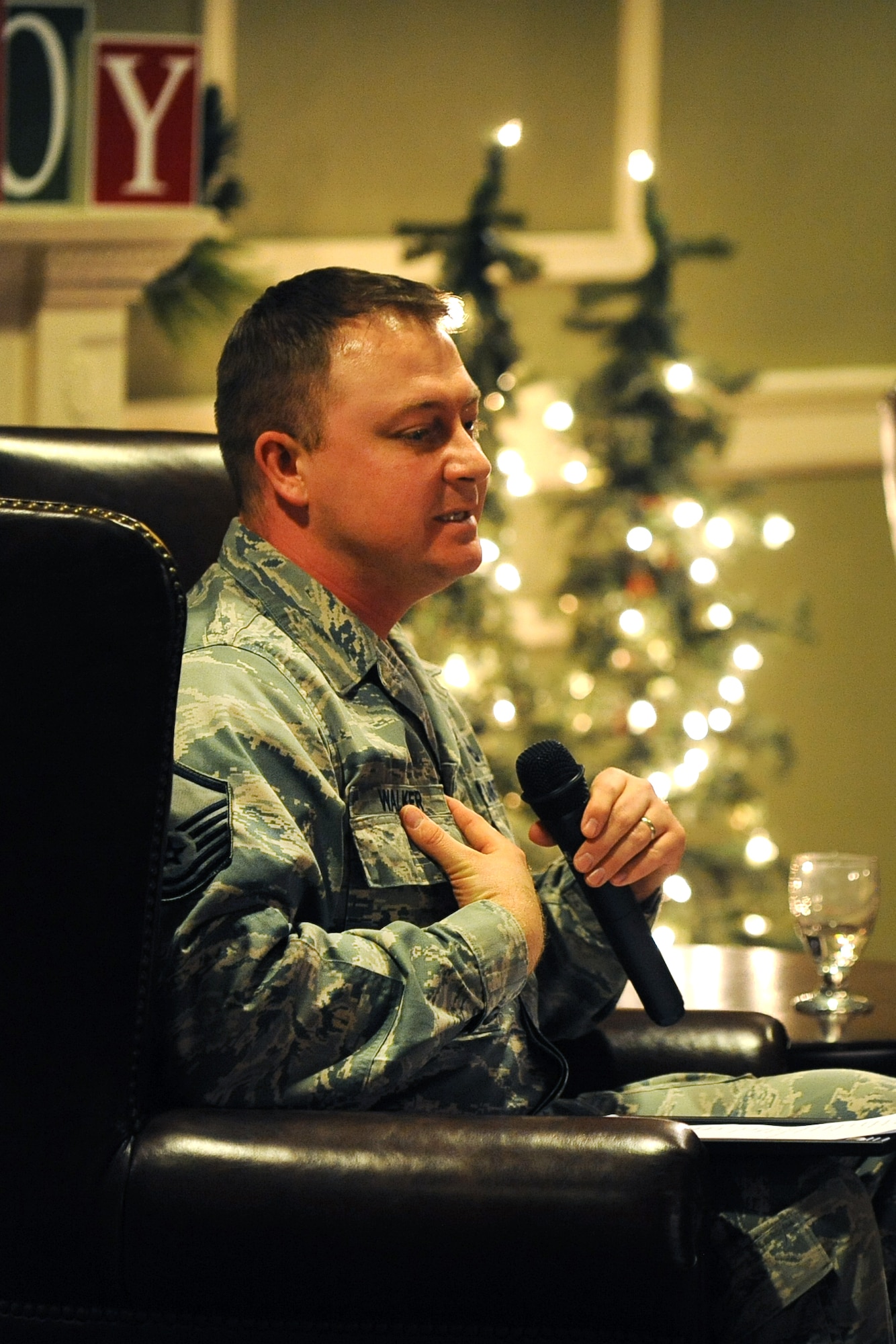 U.S. Air Force Master Sgt. John Walker, 55th Wing Chaplain’s office, opens up about his Post Traumatic Stress Disorder following his tours to Iraq during the inaugural Story Tellers event called ‘The Long and Short of it’ held on Dec. 16 at the Patriot Club on Offutt Air Force Base, Neb.  A total of four Airmen spoke about a wide range of topics in this story telling mentorship event.  (U.S. Air Force photo by Josh Plueger/Released)