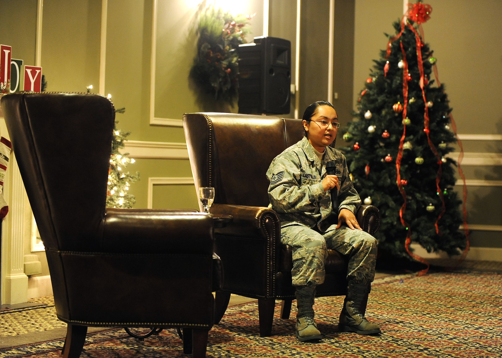 U.S. Air Force Tech. Sgt. Galicia Castillo, 55th Wing command post, opened up during the inaugural Story Tellers event called ‘The Long and Short of it’ held on Dec. 16 at the Patriot Club on Offutt Air Force Base, Neb. Castillo spoke about her struggles with depression and the help she sought and how it affected her career.   (U.S. Air Force photo by Josh Plueger/Released)
