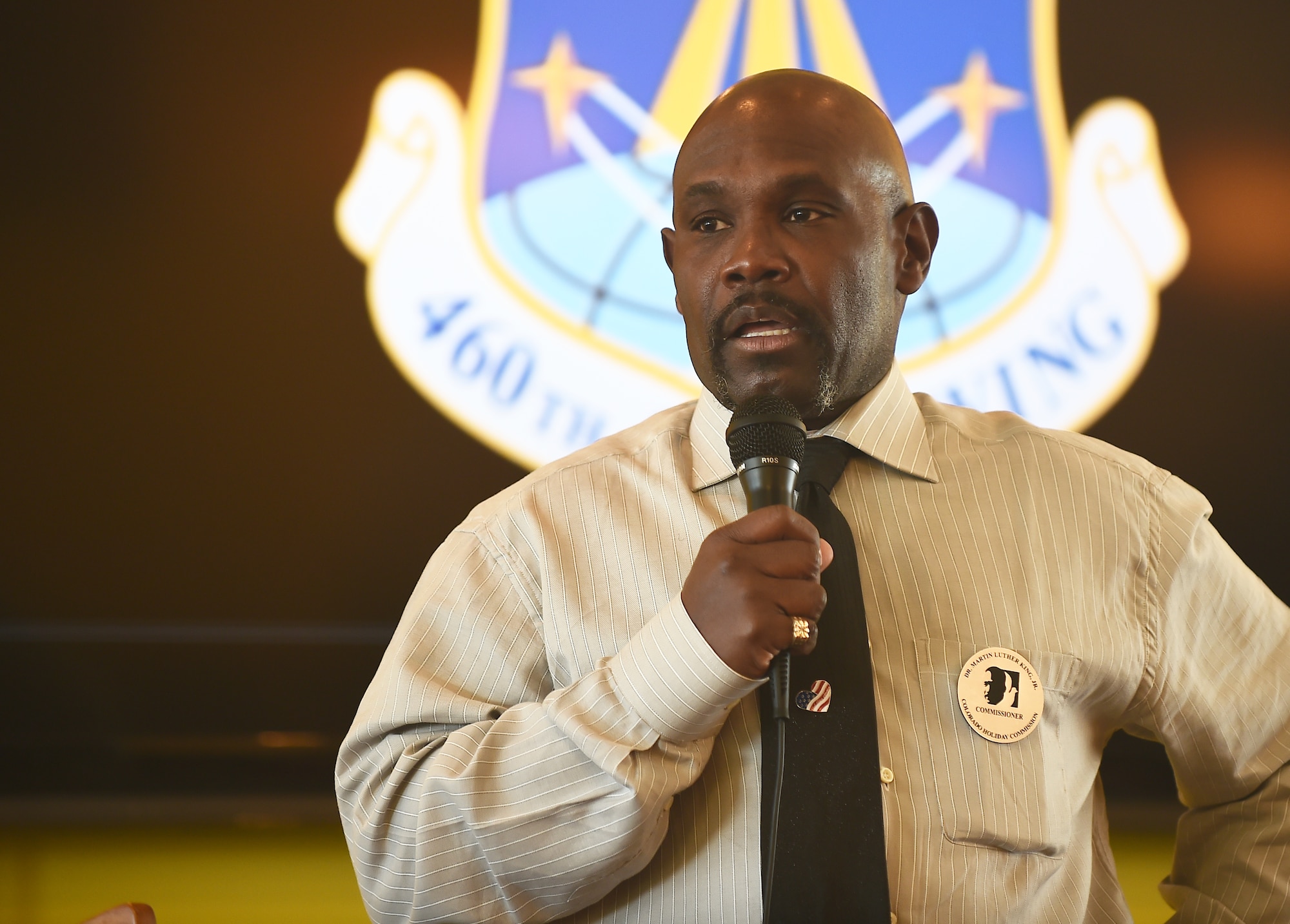 Vern L. Howard, Martin Luther King Colorado Holiday Commission chairman, spoke Jan. 22, 2015, at the Panther Den on Buckley AFB, Colo., to commemorate Dr. Martin Luther King Jr. Howard spoke of the trials and tribulations MLK triumphed through when striving for equal rights. (U.S. Air Force photo by Airman 1st Class Luke Nowakowski/Released)