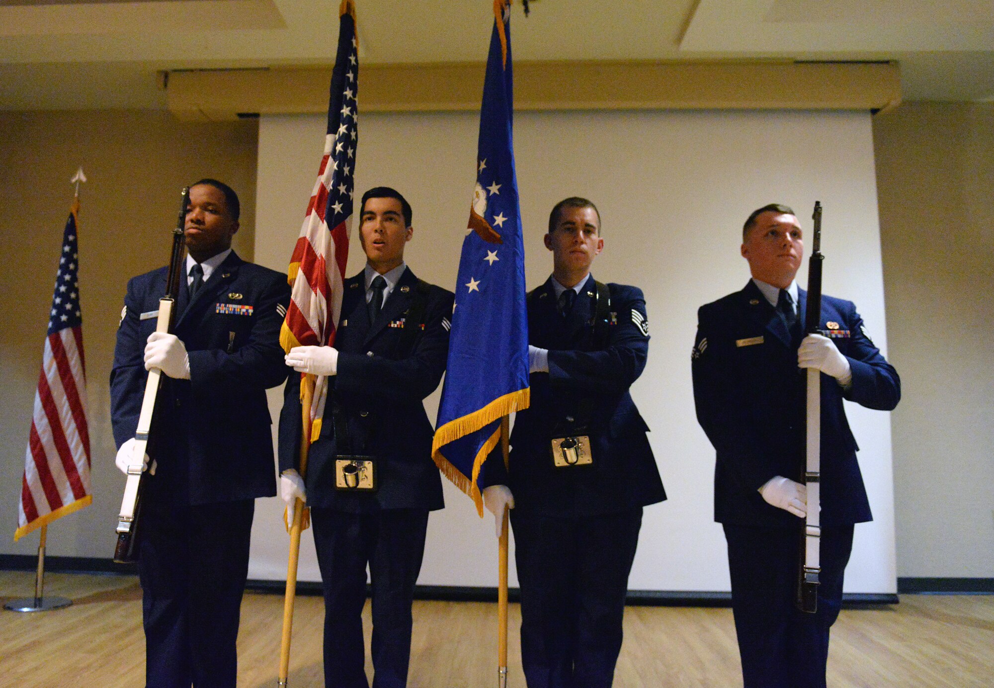 The Moody Air Force Base Honor Guard presents the colors for the 2015 Chief Master Sergeant Recognition Ceremony Jan. 16, 2015, at Moody Air Force Base, Ga. The base ceremonial guardsmen performed sequential movements as a customary act during the ceremony.  (U.S. Air Force photo by Airman Greg Nash/Released) 
