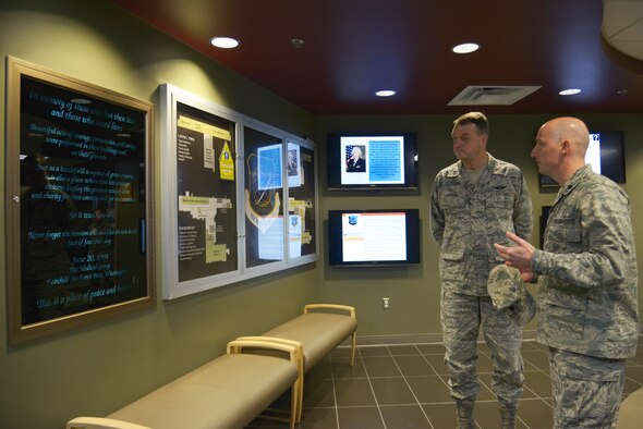 Lt. Col. Richard Broyer, 92nd Medical Support Squadron commander, gives Brig. Gen. (Dr.) Kory Cornum, Air Mobility Command command surgeon, a tour of the 92nd Medical Group building Jan. 13, 2015, at Fairchild Air Force Base, Wash. Cornum visited the base to experience Fairchild's medical mission firsthand. (U.S. Air Force photo/Senior Airman Janelle Patiño)