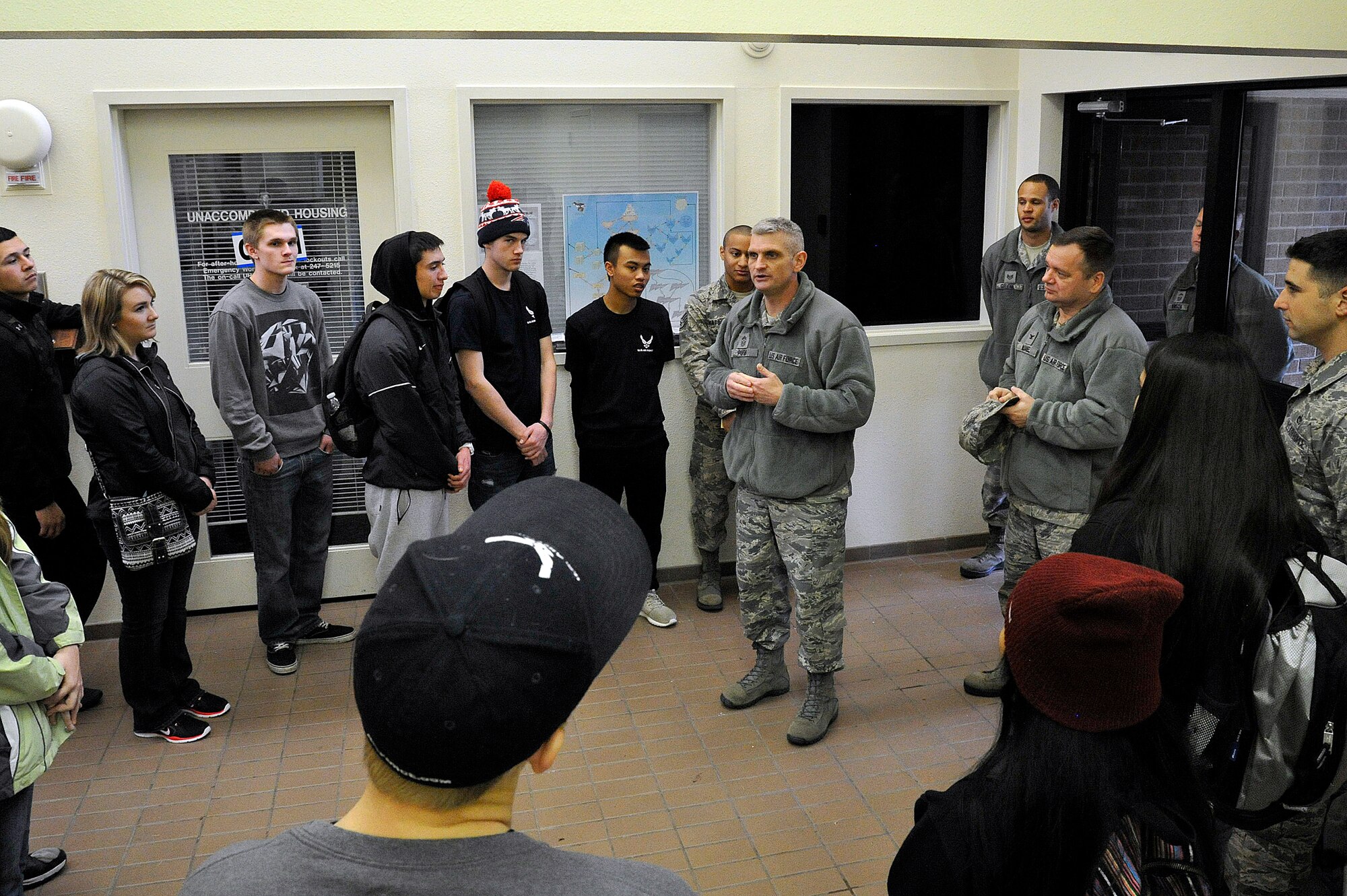 Potential Air Force recruits with the 361st Recruiting Squadron, in Kennewick, Wash., receive a briefing from Chief Master Sgt. Christian M. Pugh, 92nd Air Refueling Wing command chief, Jan. 22, 2015, at Fairchild Air Force Base, Wash. Pugh, along with Col. Brian McDaniel, 92nd Air Refueling Wing commander, spoke with the potential recruits about the benefits of joining the Air Force. (U.S. Air Force photo by/Airman 1st Class Nicolo J. Daniello)