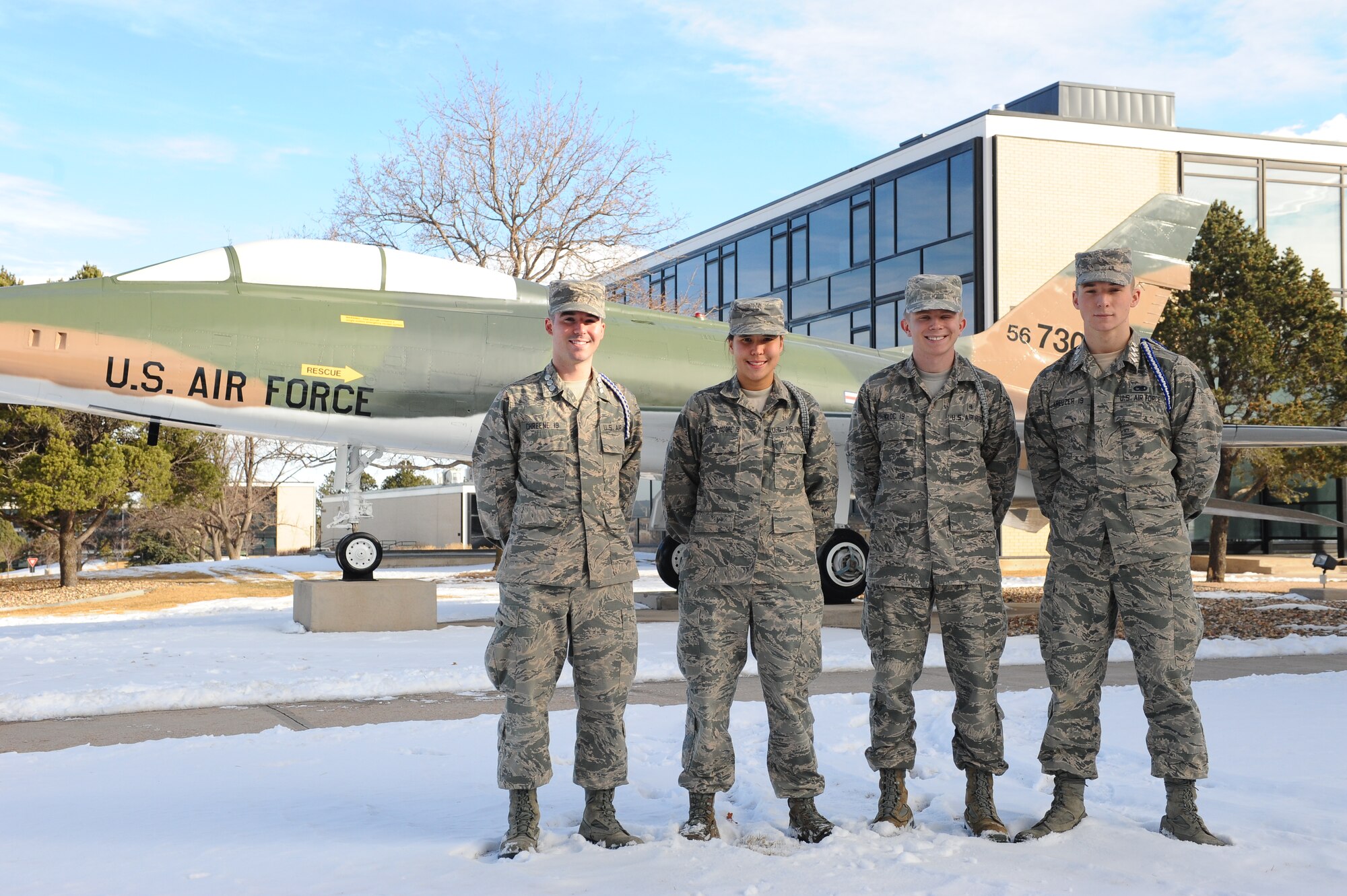 Academy Preparatory School Cadet Candidates Chad E. Chreene II (left), Caitlin Stewart-Moore, Joseph Kloc and Jared Kreuzer stand outside the Prep School Jan. 16, 2015. All four cadet candidates earned 4.0 GPAs for the second quarter of the academic year. (U.S. Air Force photo/Airman 1st Class Rachel Hammes)