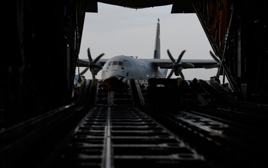 A 37th Airlift Squadron C-130J Super Hercules departs the runway after landing at Orleans - Bricy Air Base, France, Jan. 21, 2015. Ramstein joined the French Air Force in Volfa 15-1, an annual exercise to develop their interoperability and ability to respond anytime, anywhere. (U.S. Air Force photo/Senior Airman Armando A. Schwier-Morales)