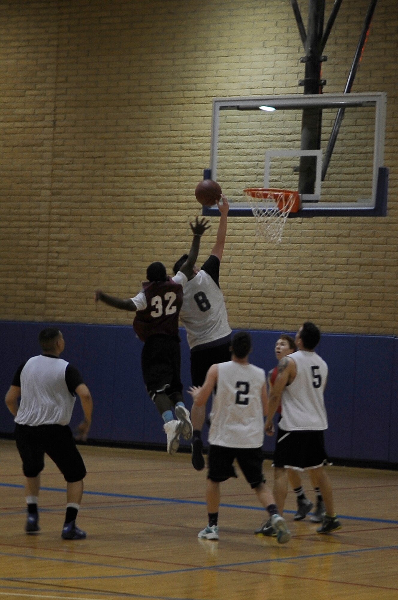 The 607th Air Control Squadron defeated the 56th Operations Support Squadron 60-44 Jan. 14 in an early season intramural basketball game. (U.S. Air Force photo/Airman Pedro Mota)