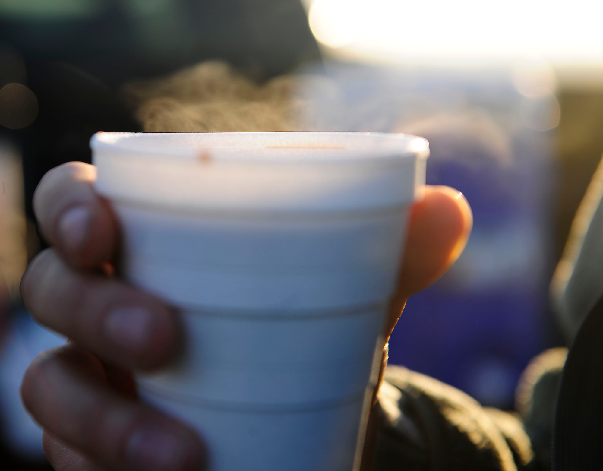 A 39th Security Forces Squadron defender holds a cup of hot chocolate Jan. 23, 2015, at Incirlik Air Base, Turkey. The First Sergeant’s group teamed up with members from the base chapel to serve hot chocolate and cookies to several units around base. (U.S. Air Force photo by Senior Airman Krystal Ardrey/Released)