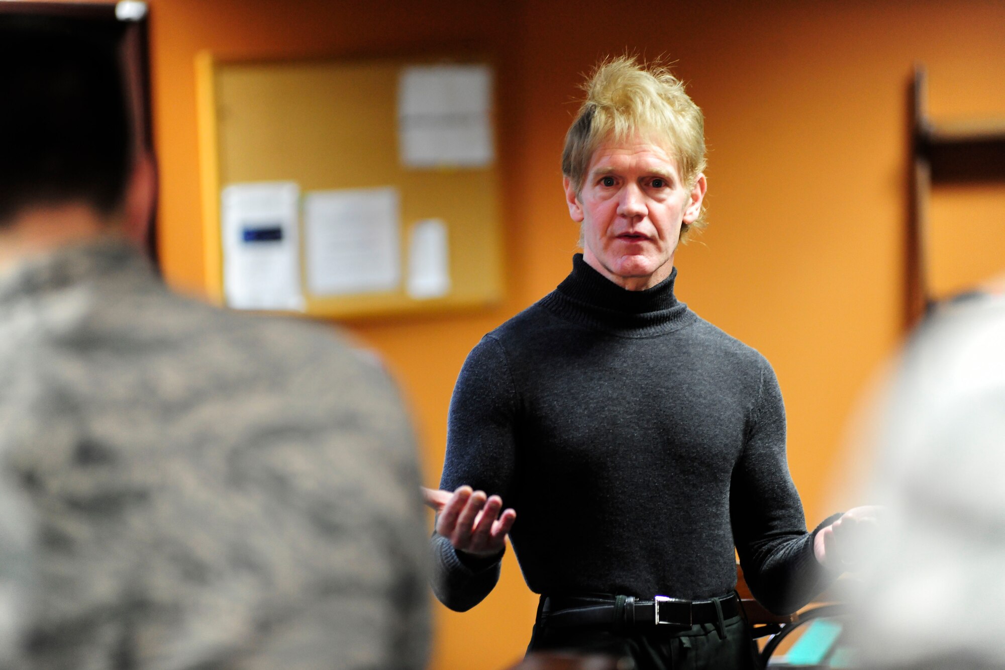 Robert Gobble, Health and Wellness Center health promotion coordinator, speaks during a Women’s Diversity Council “New Year, New You” luncheon Jan. 22, 2015, at Incirlik Air Base, Turkey.  Gobble spoke about healthy habits and how to maintain those habits throughout the year. (U.S. Air Force photo by Senior Airman Krystal Ardrey/Released)