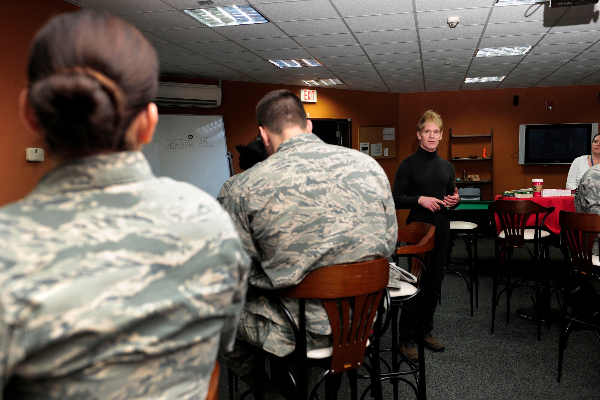 Robert Gobble, Health and Wellness Center health promotion coordinator, speaks during a Women’s Diversity Council “New Year, New You” luncheon Jan. 22, 2015, at Incirlik Air Base, Turkey. Gobble spoke about healthy habits and behaviors. (U.S. Air Force photo by Senior Airman Krystal Ardrey/Released)