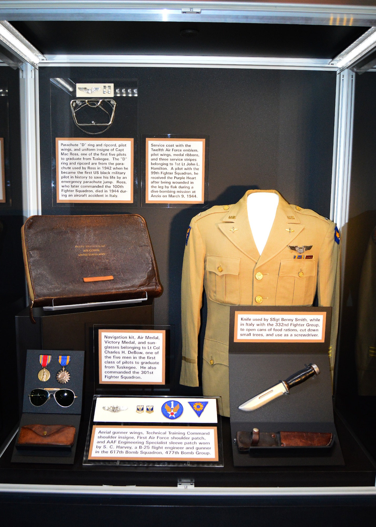 DAYTON, Ohio -- Various artifacts on display in the Tuskegee Airmen Exhibit in the WWII Gallery at the National Museum of the U.S. Air Force. (U.S. Air Force photo)