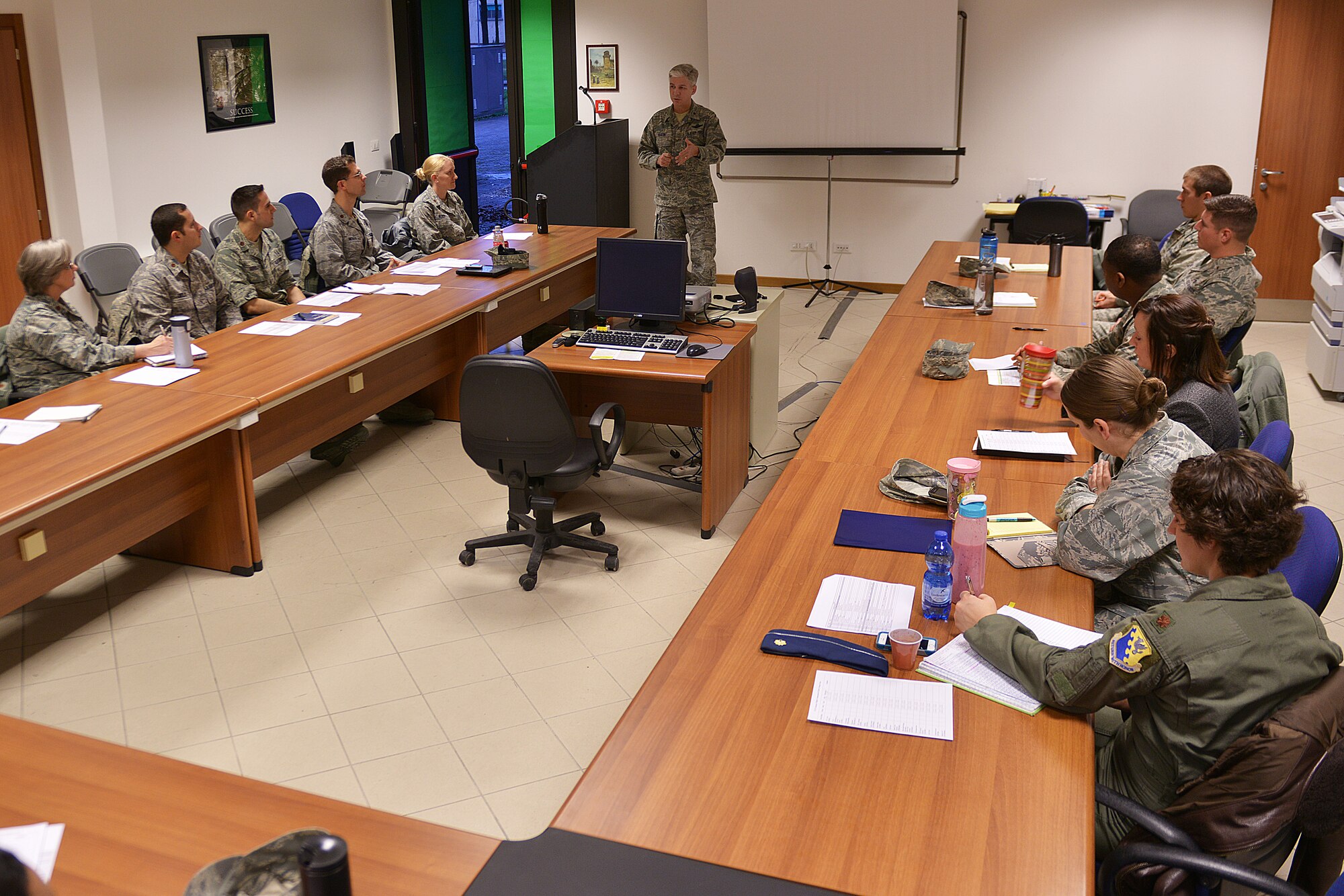 U.S. Air Force Brig. Gen. Barre R. Seguin, 31st Fighter Wing commander, speaks to a group of newly-appointed flight commanders and chiefs, Jan. 22, 2015, at Aviano Air Base, Italy. Twenty-two people attended the course, which included lieutenants, captains, majors, senior NCOs and a civilian. (U.S. Air Force photo by Airman 1st Class Ryan Conroy/Released)