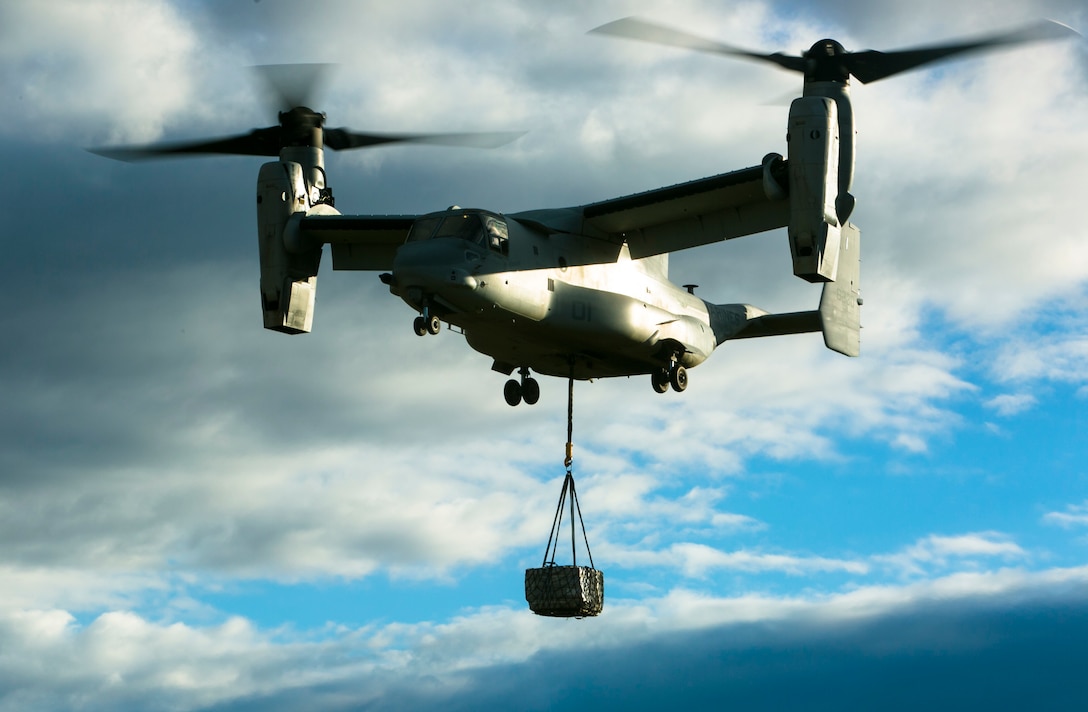 An MV-22 Osprey from Special-Purpose Marine Air-Ground Task Force Crisis Response-Africa flies with a 2180-pound pallet during an external-lift drill at Morón Air Base, Spain, Jan. 19, 2015. The unique vertical and horizontal flight capabilities make it a flexible delivery platform for Marine forces operating in the area. (U.S. Marine Corps photo by Sgt. Paul Peterson)