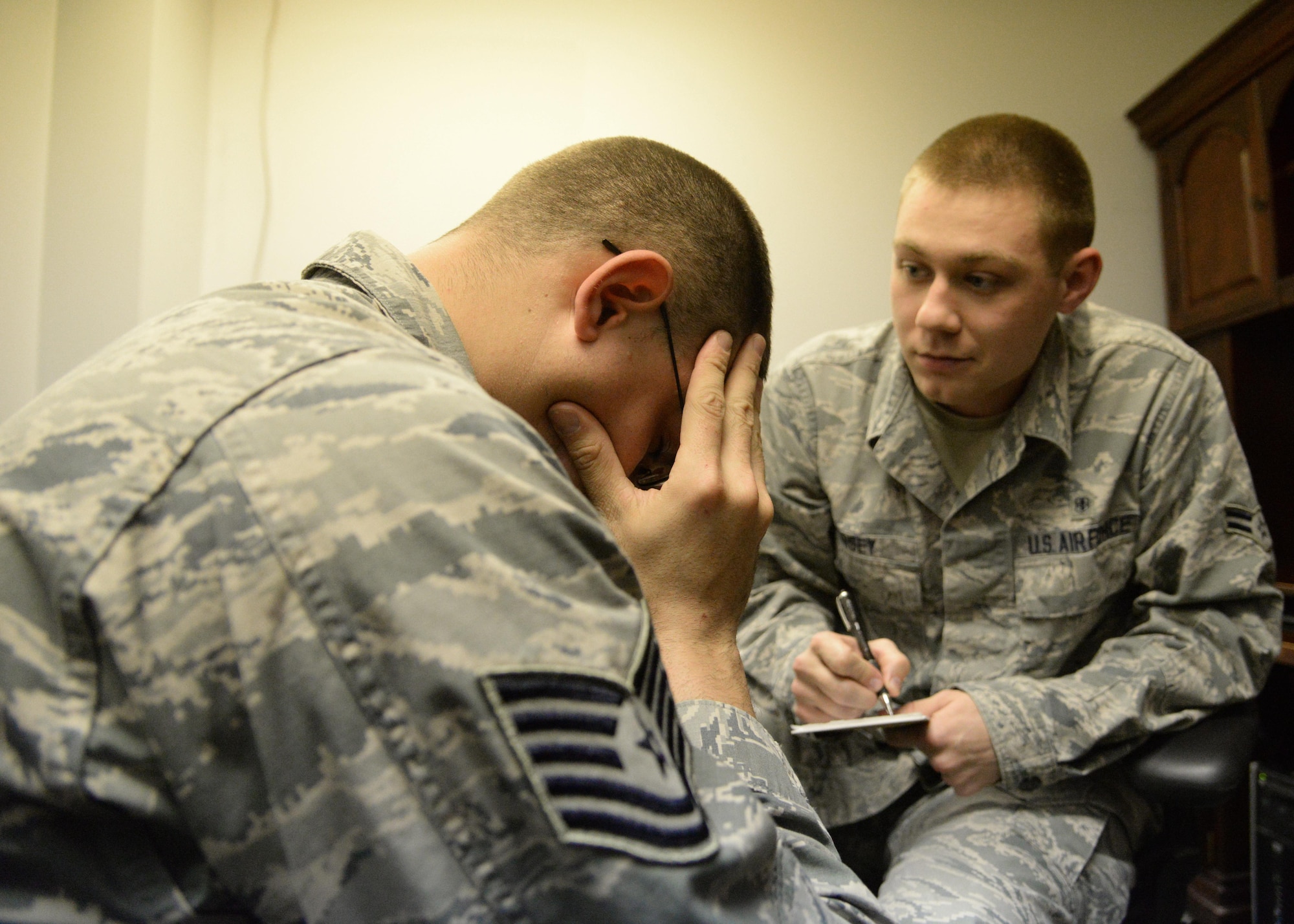U.S. Air Force Airman 1st Class Austin Dorsey, 27th Special Operations Aerospace Medicine Squadron mental health technician, conducts a session with a noncommissioned officer Jan. 21, 2015 at Cannon Air Force Base, N.M. Mental health is just one of the more than 10 fields that make up the biomedical sciences corps at Cannon. (U.S. Air Force photo/Staff Sgt. Alexxis Mercer) 